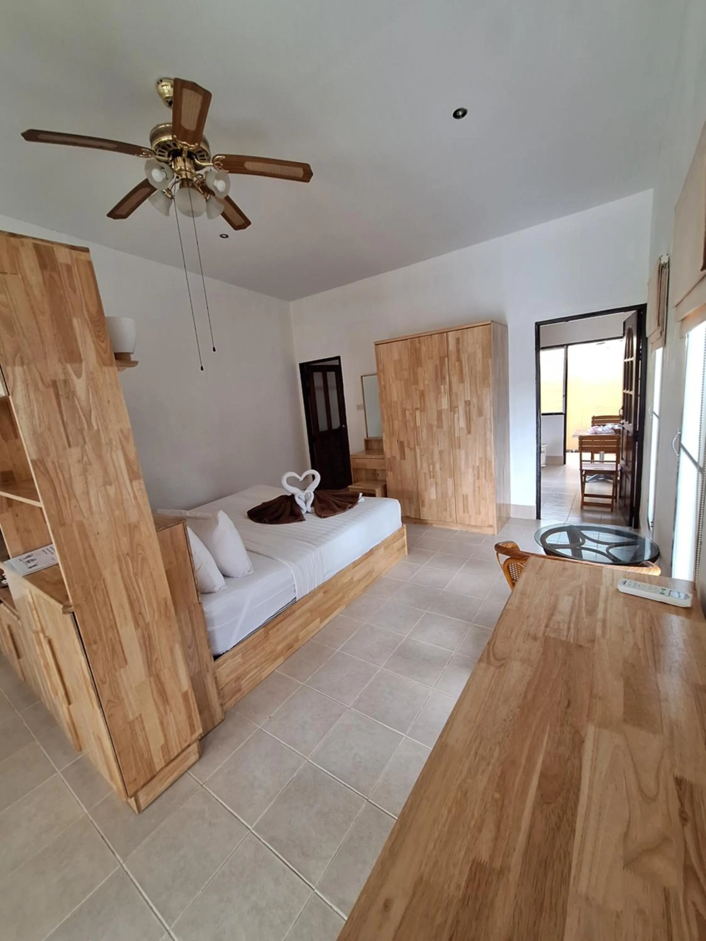 Bed in Jungle Village Bungalow