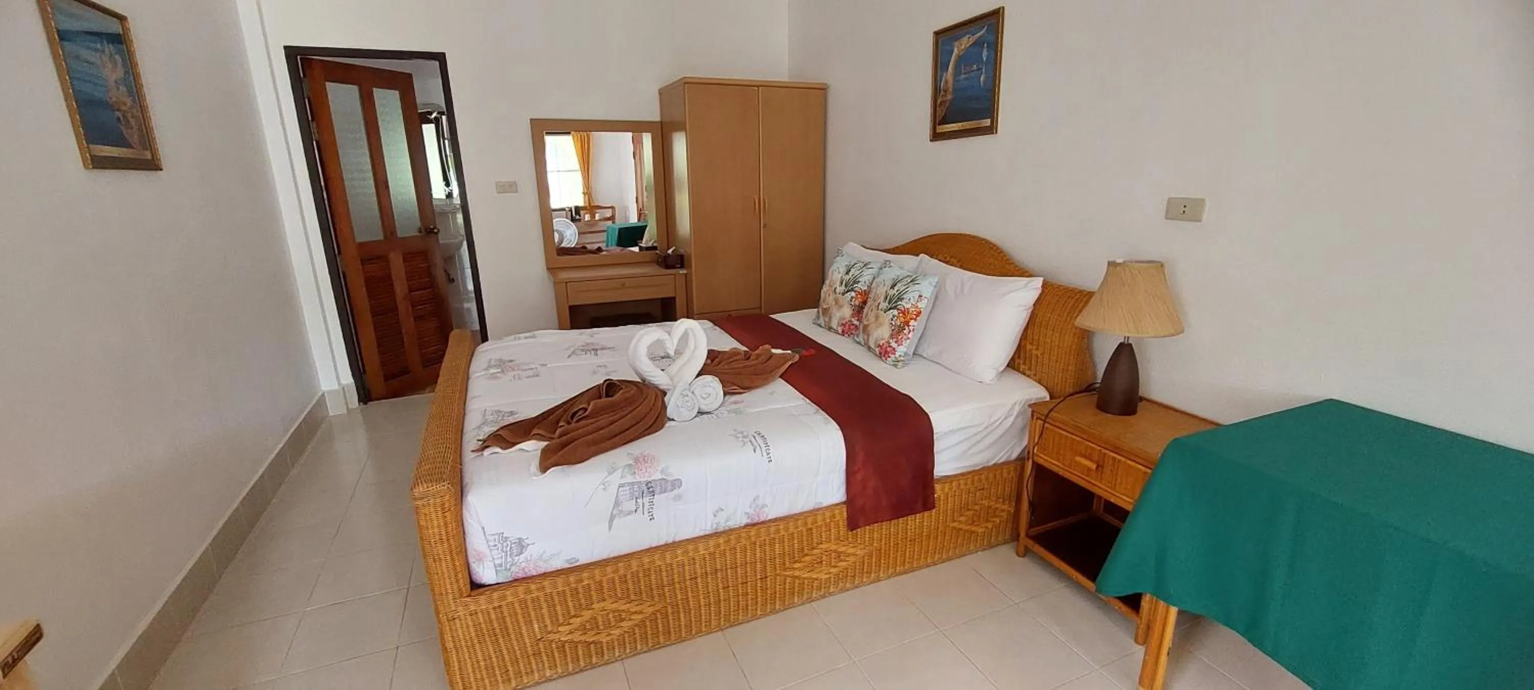 Bed in Jungle Village Bungalow