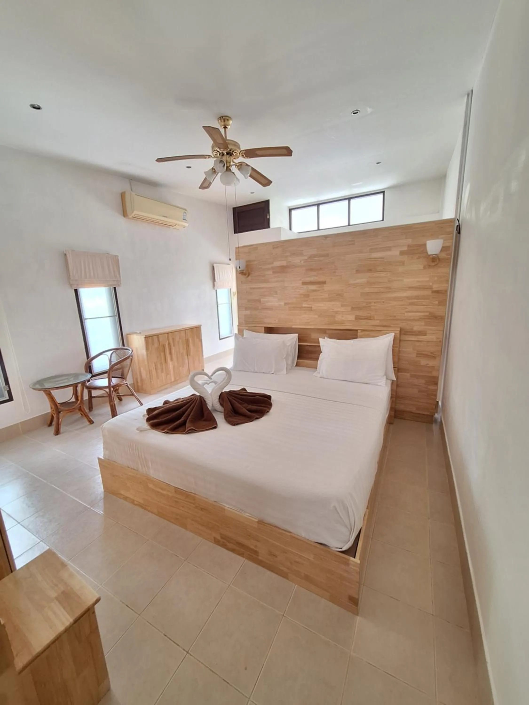 Bed in Jungle Village Bungalow