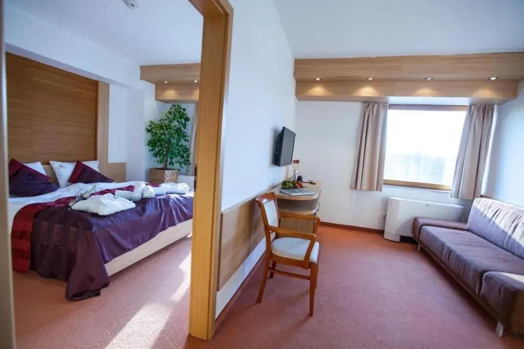 Living room, Bed in Hotel Corvus Aqua Living room, Bed in Hotel Corvus Aqua