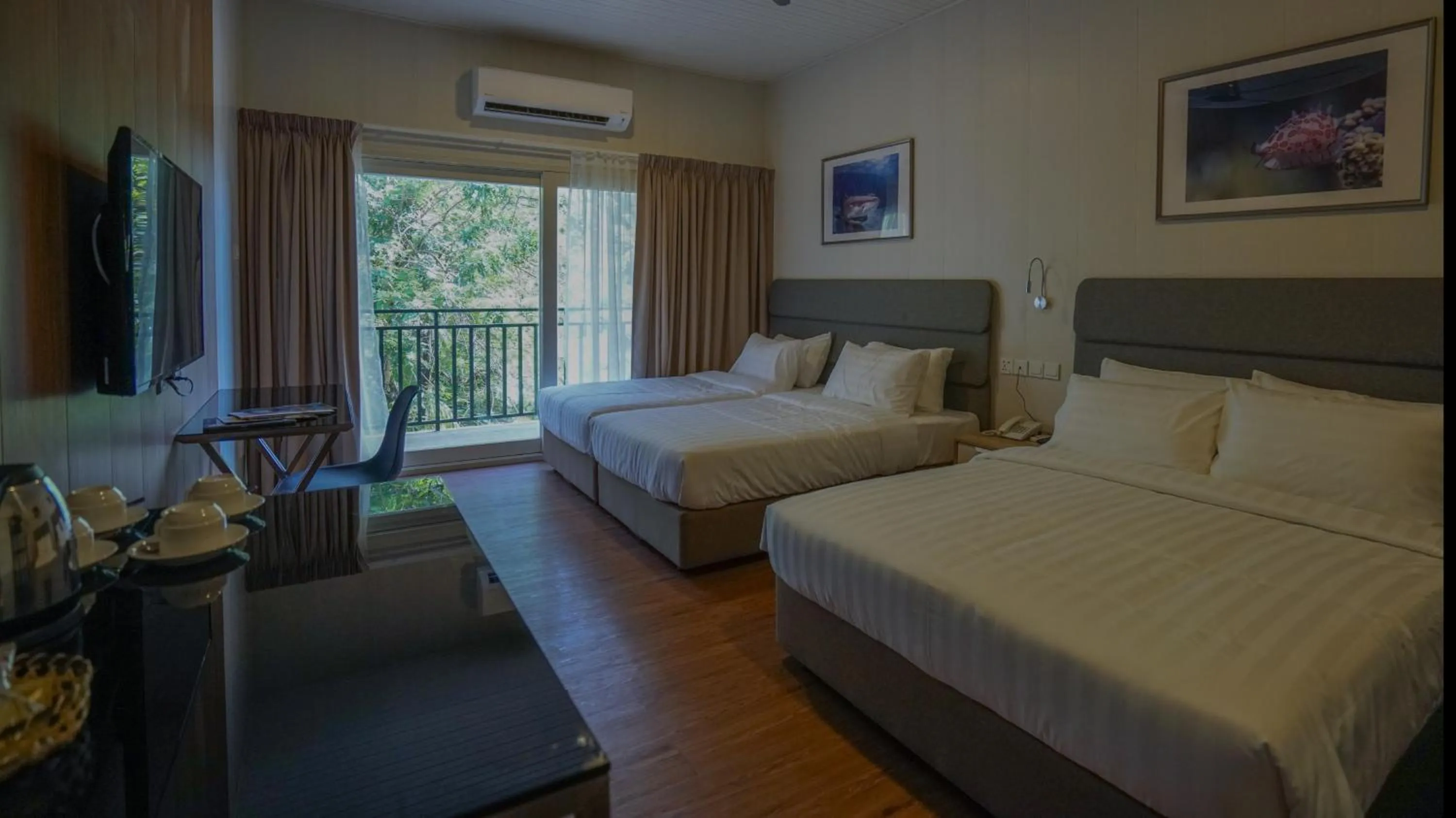 Bed in Aman Tioman Beach Resort