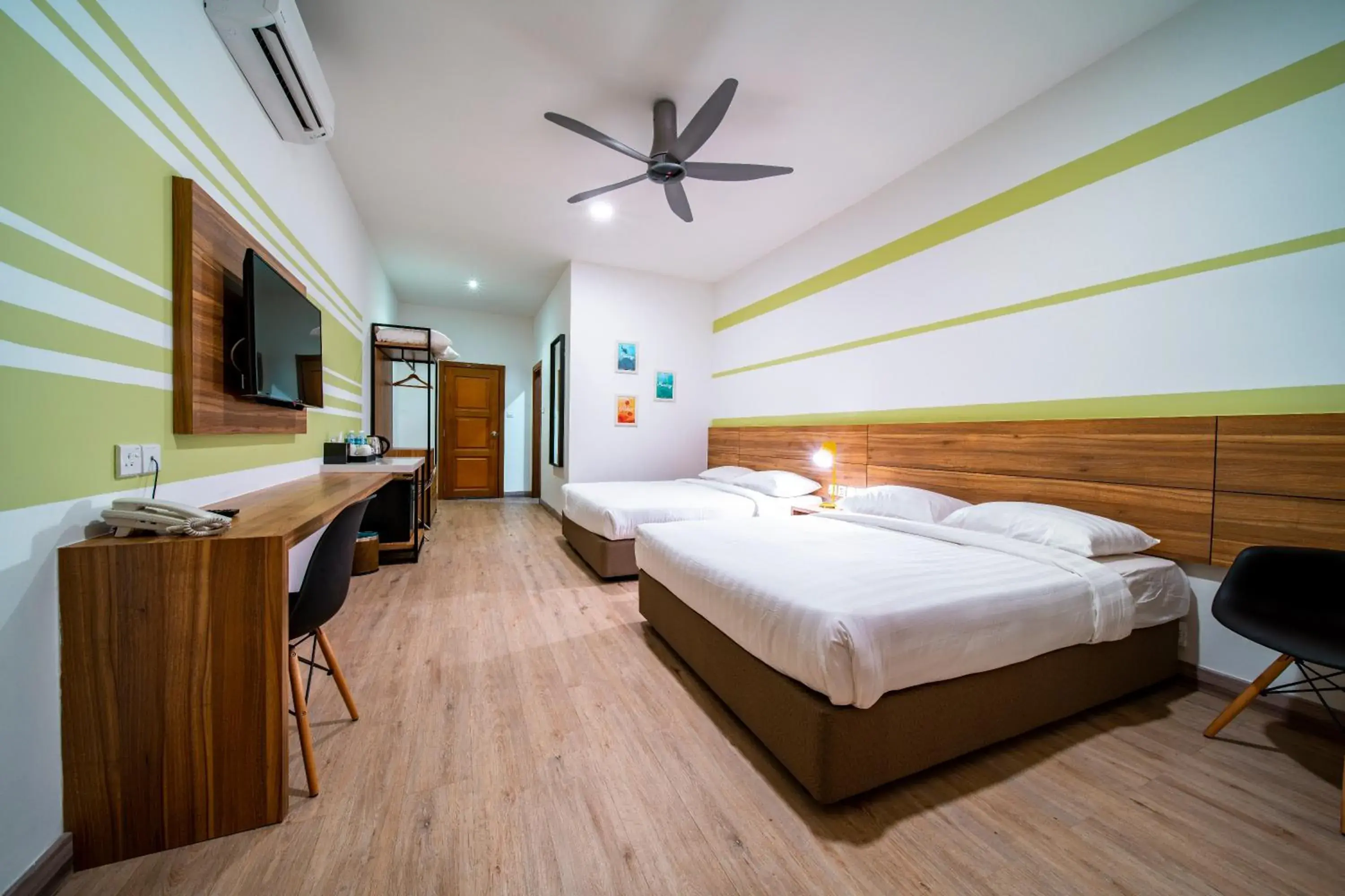 Bed in Aman Tioman Beach Resort Bed in Aman Tioman Beach Resort