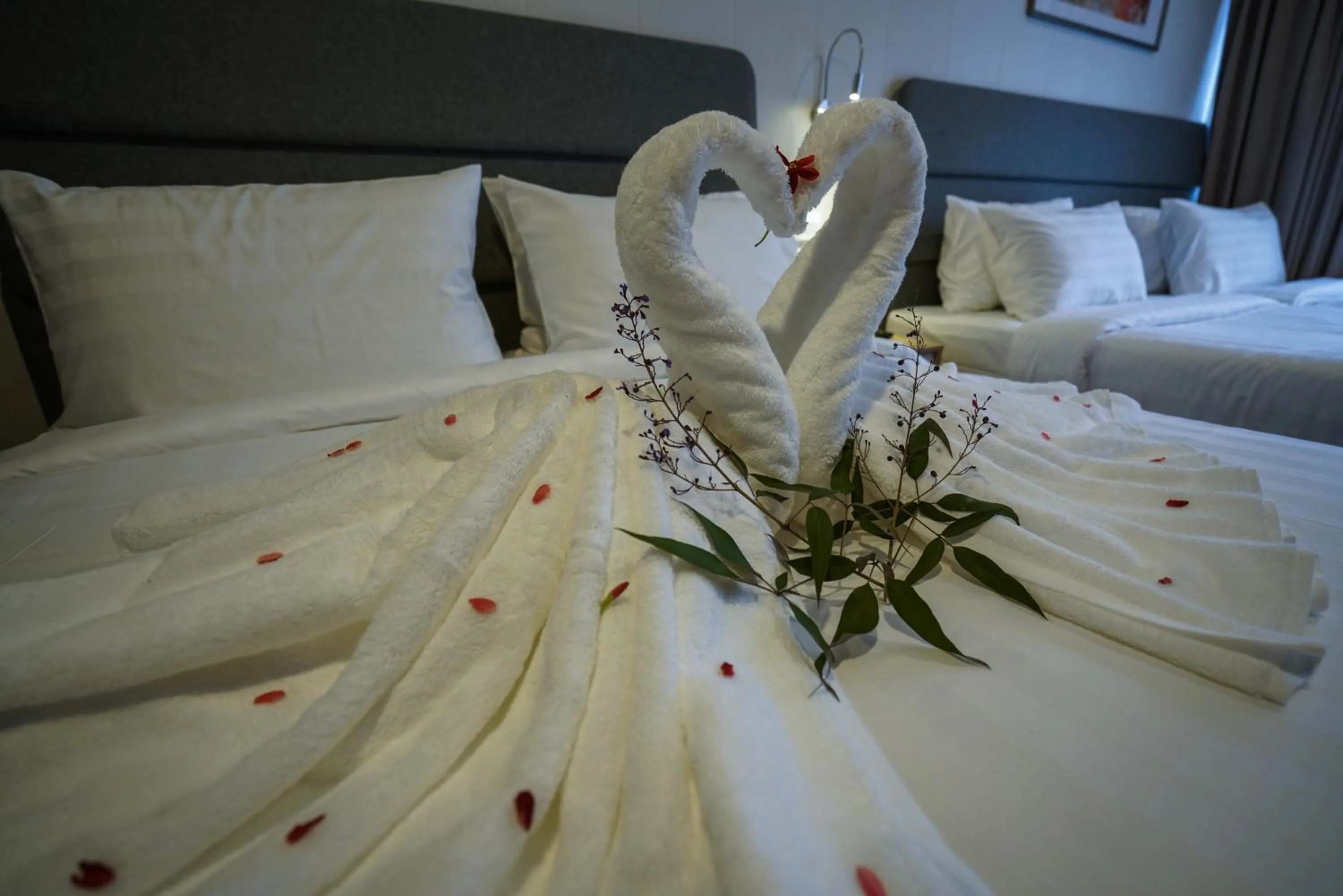 Bed in Aman Tioman Beach Resort