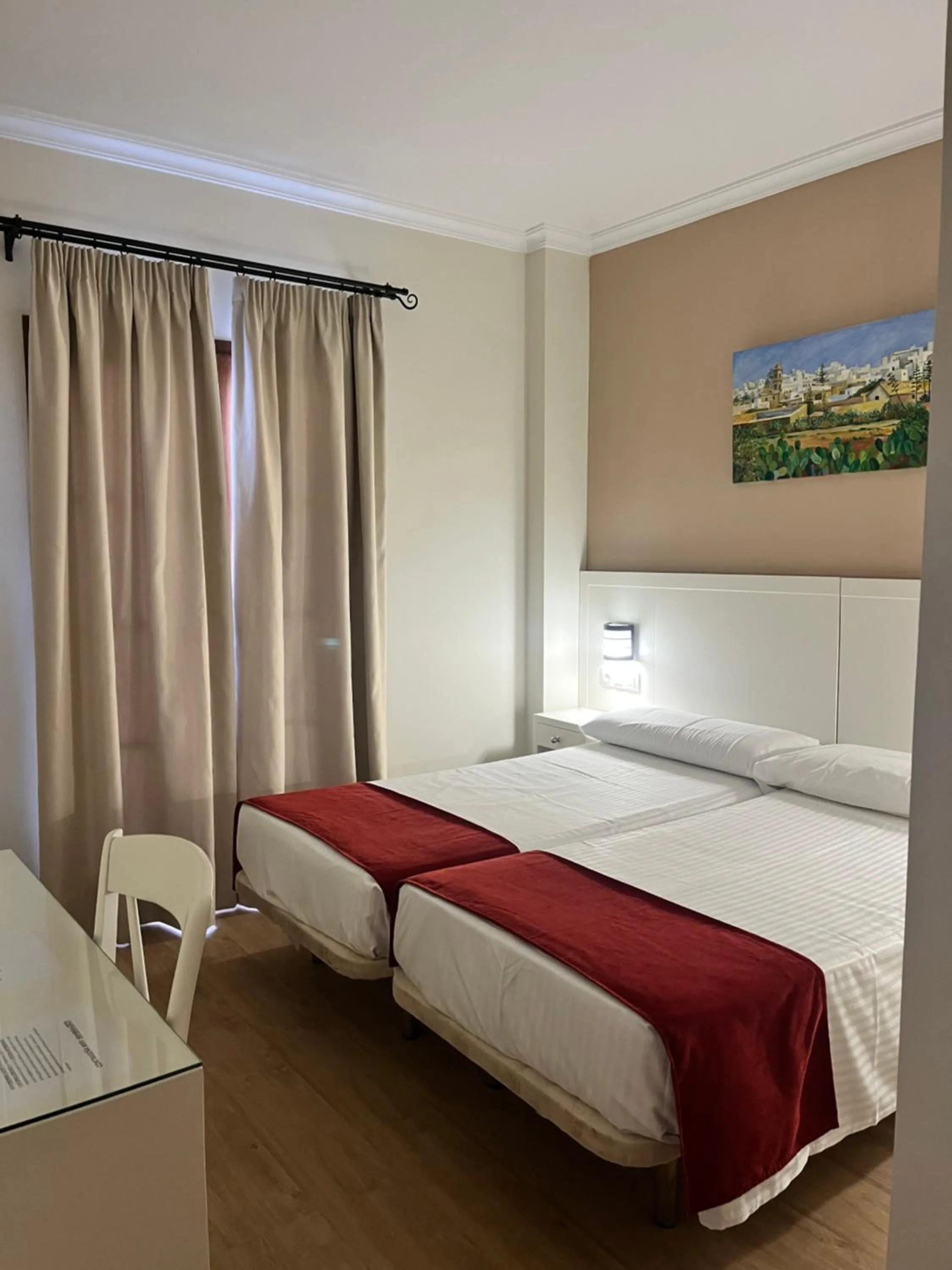 Photo of the whole room, Bed in Hostal Al-Andalus