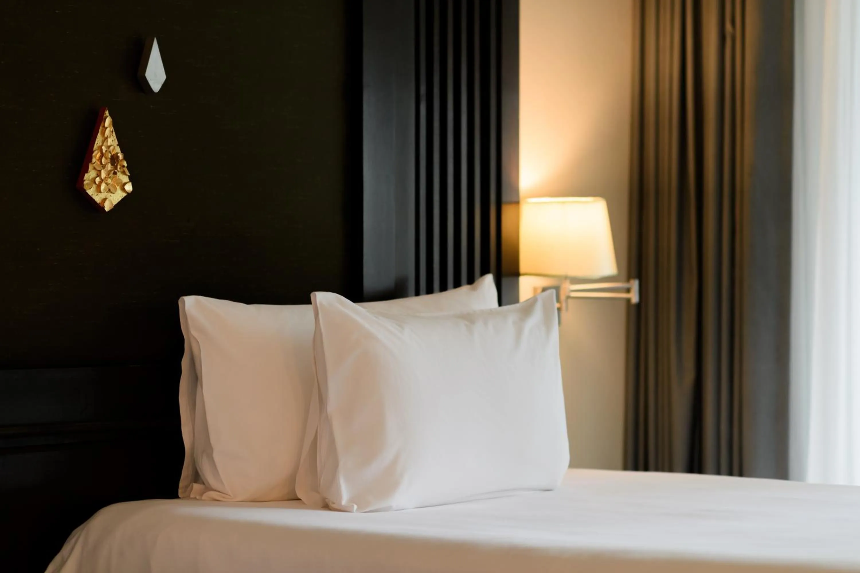 Bed in Centara Anda Dhevi Resort & Spa Krabi