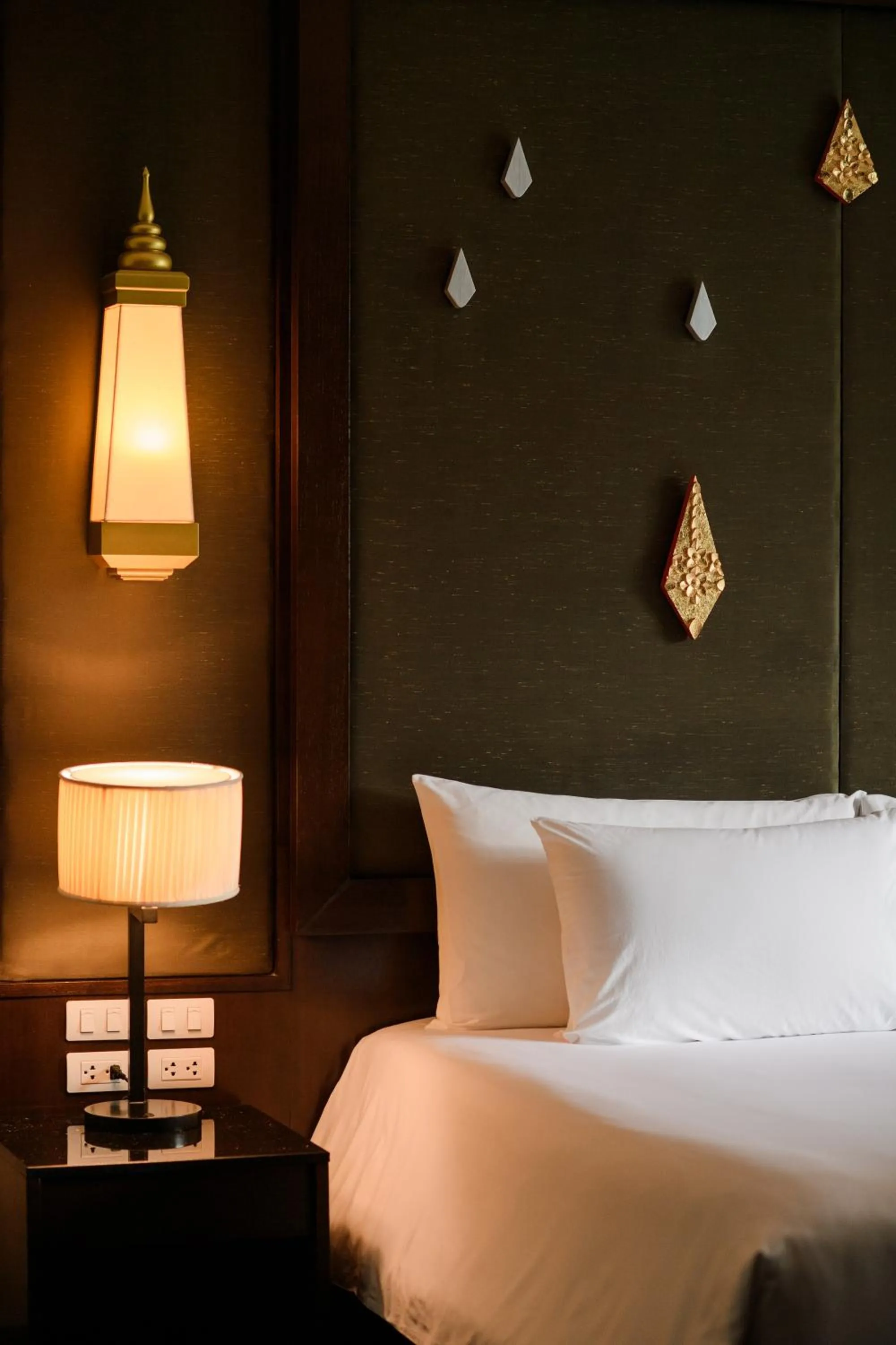 Bed in Centara Anda Dhevi Resort & Spa Krabi