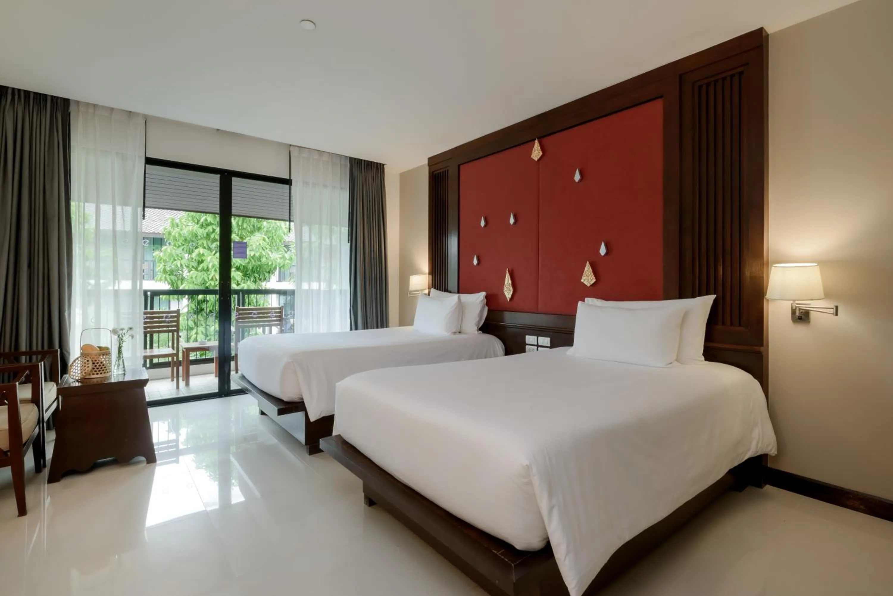 Bed in Centara Anda Dhevi Resort & Spa Krabi