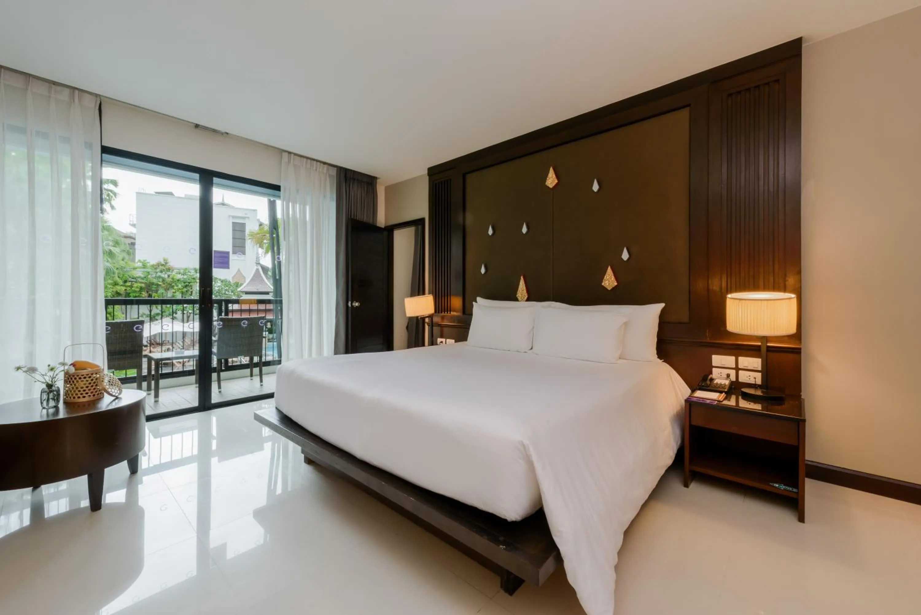 Bed in Centara Anda Dhevi Resort & Spa Krabi