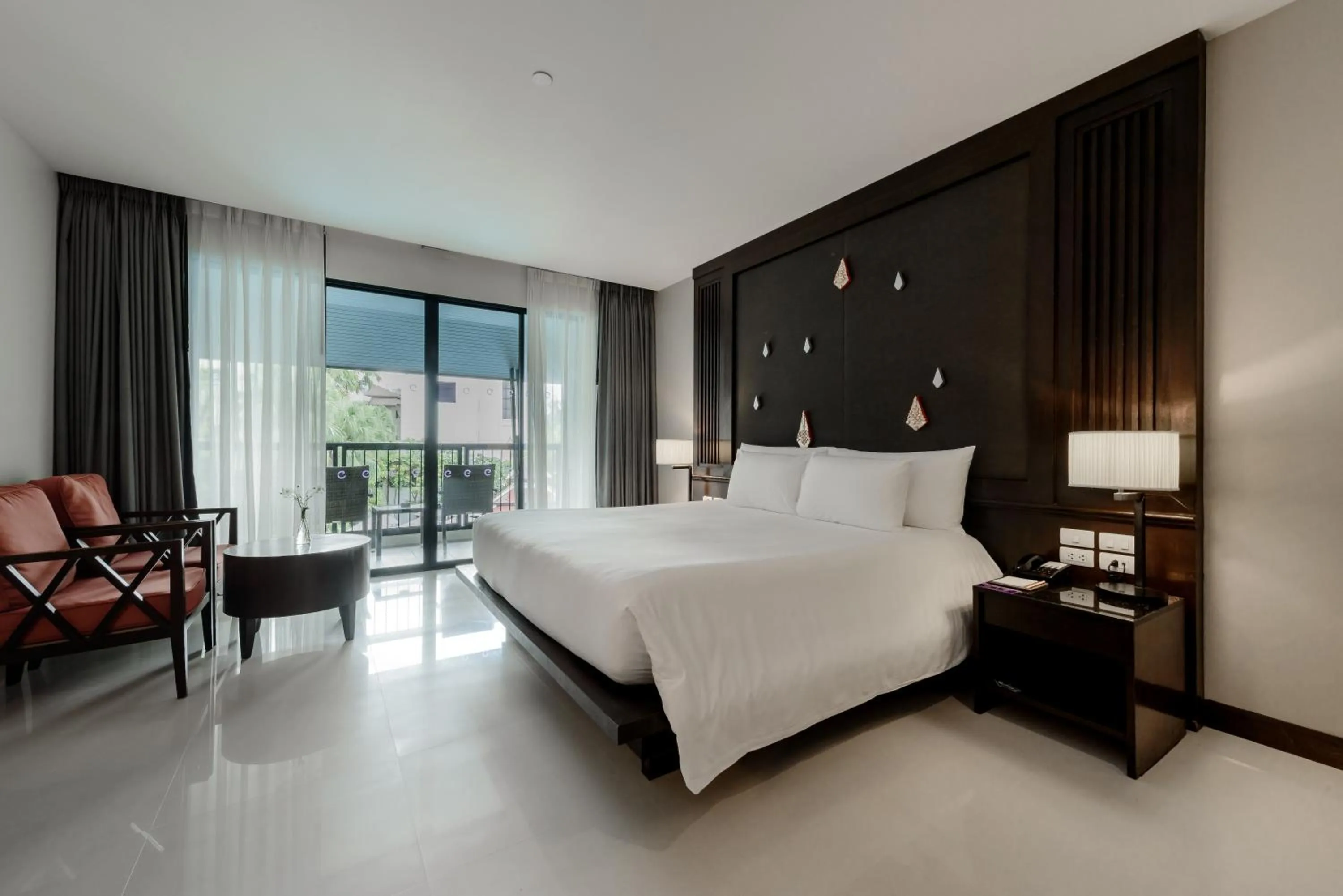 Bed in Centara Anda Dhevi Resort & Spa Krabi