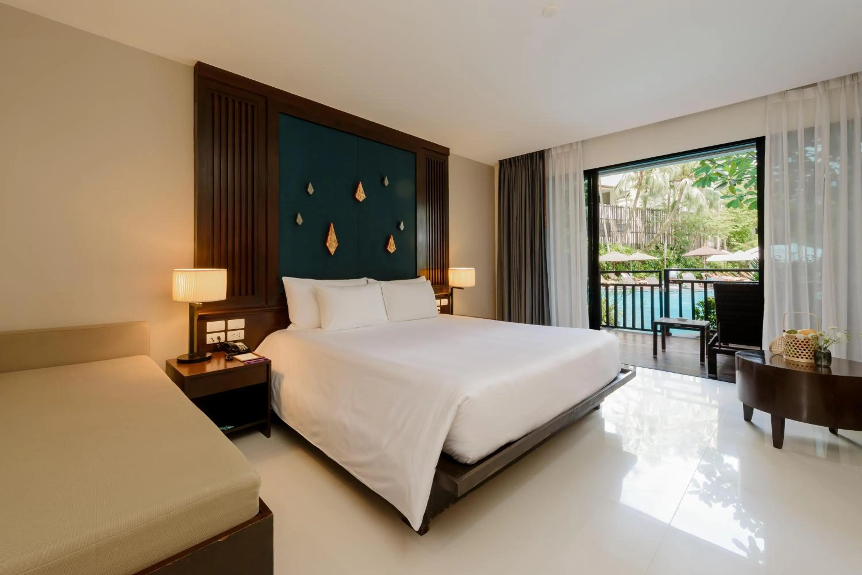 Bed in Centara Anda Dhevi Resort & Spa Krabi