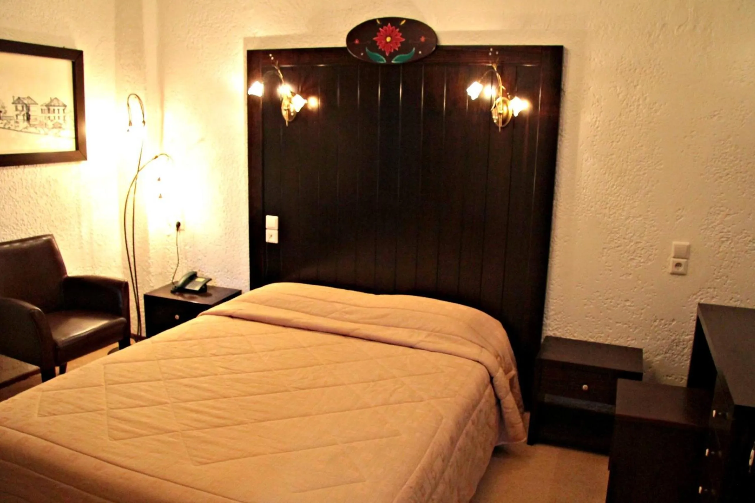 Bed in Hotel Taxiarches