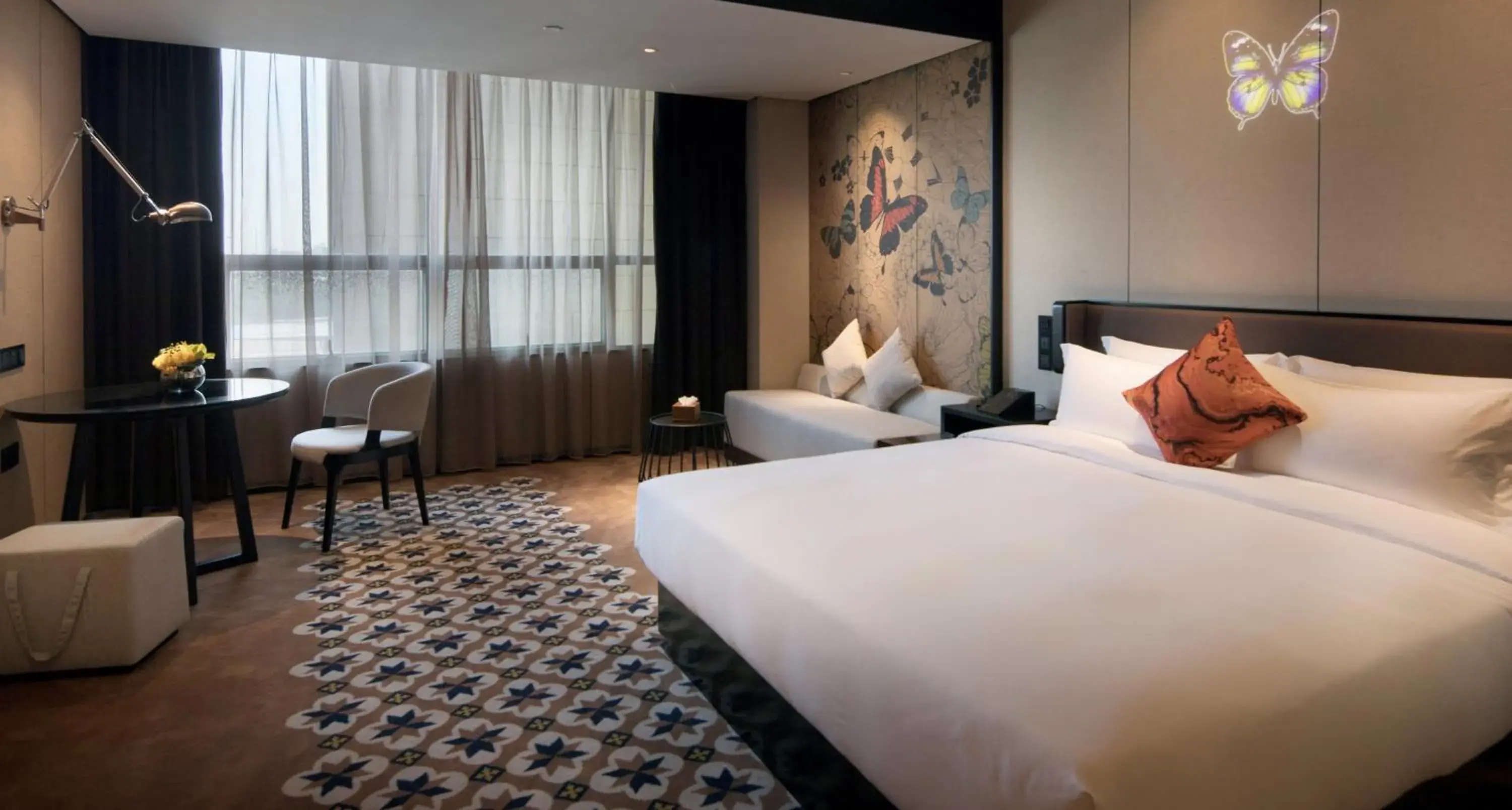 Seating area, Bed in Paco Hotel Chebeinan Metro Guanghzou-Free Shuttle Bus For Canton Fair Seating area, Bed in Paco Hotel Chebeinan Metro Guanghzou-Free Shuttle Bus For Canton Fair