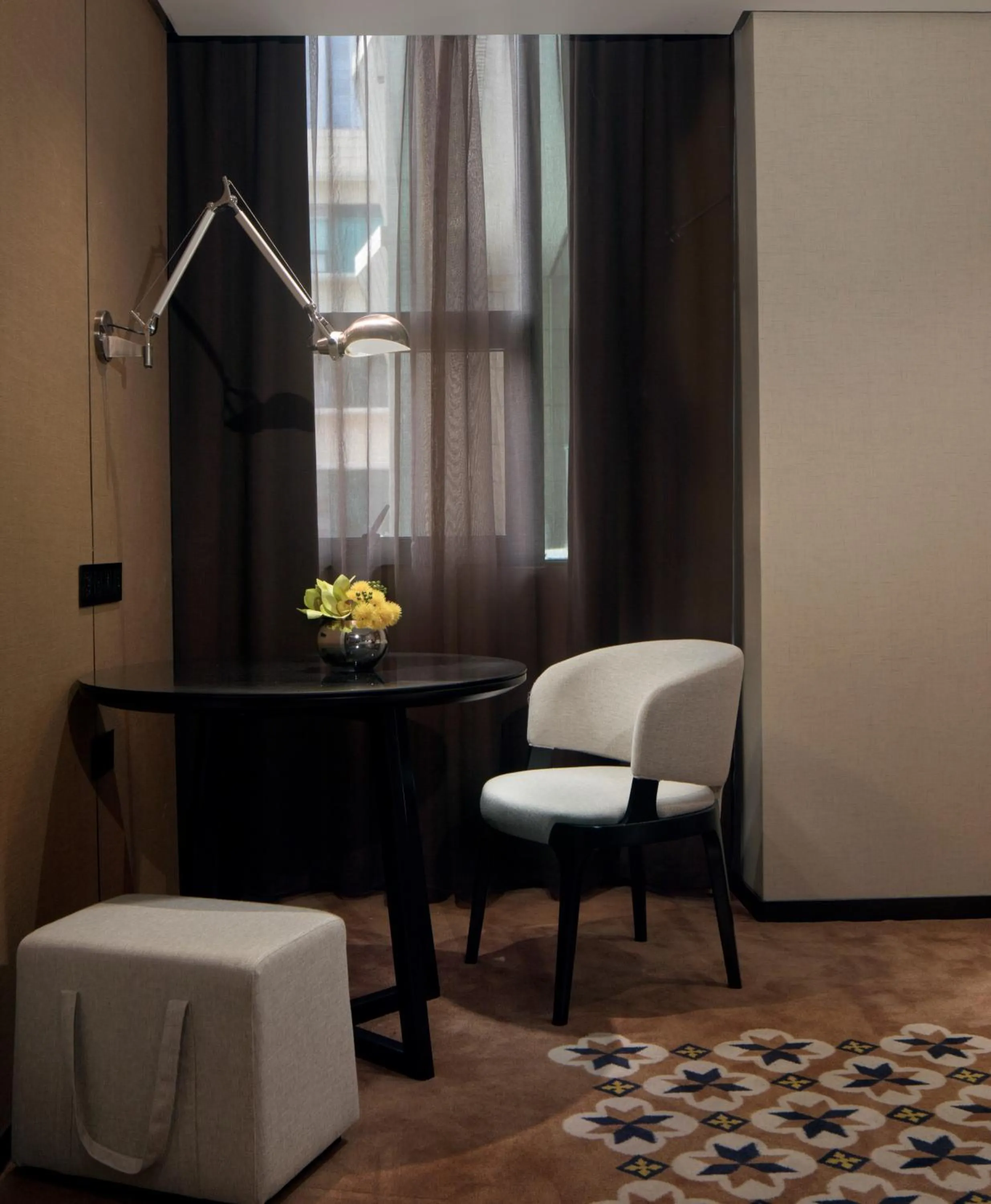 Seating area in Paco Hotel Chebeinan Metro Guanghzou