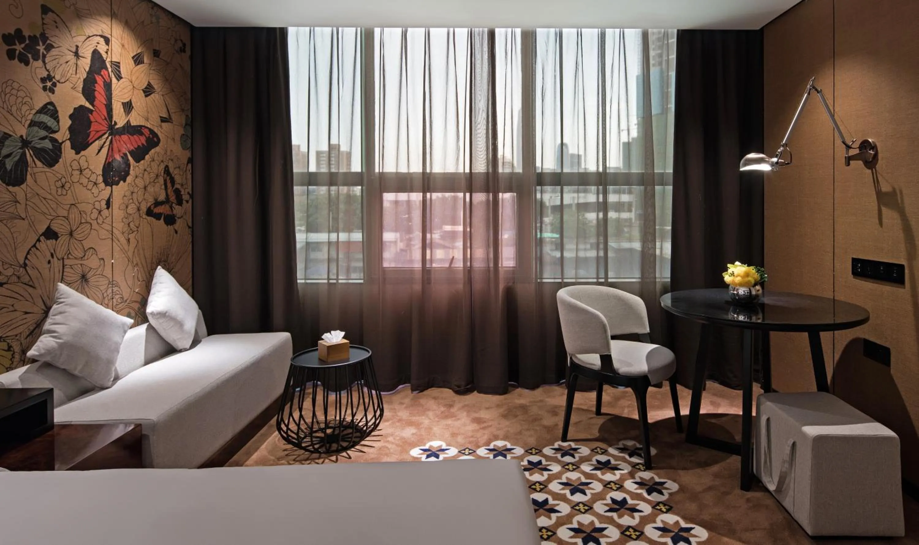 Seating area in Paco Hotel Chebeinan Metro Guanghzou