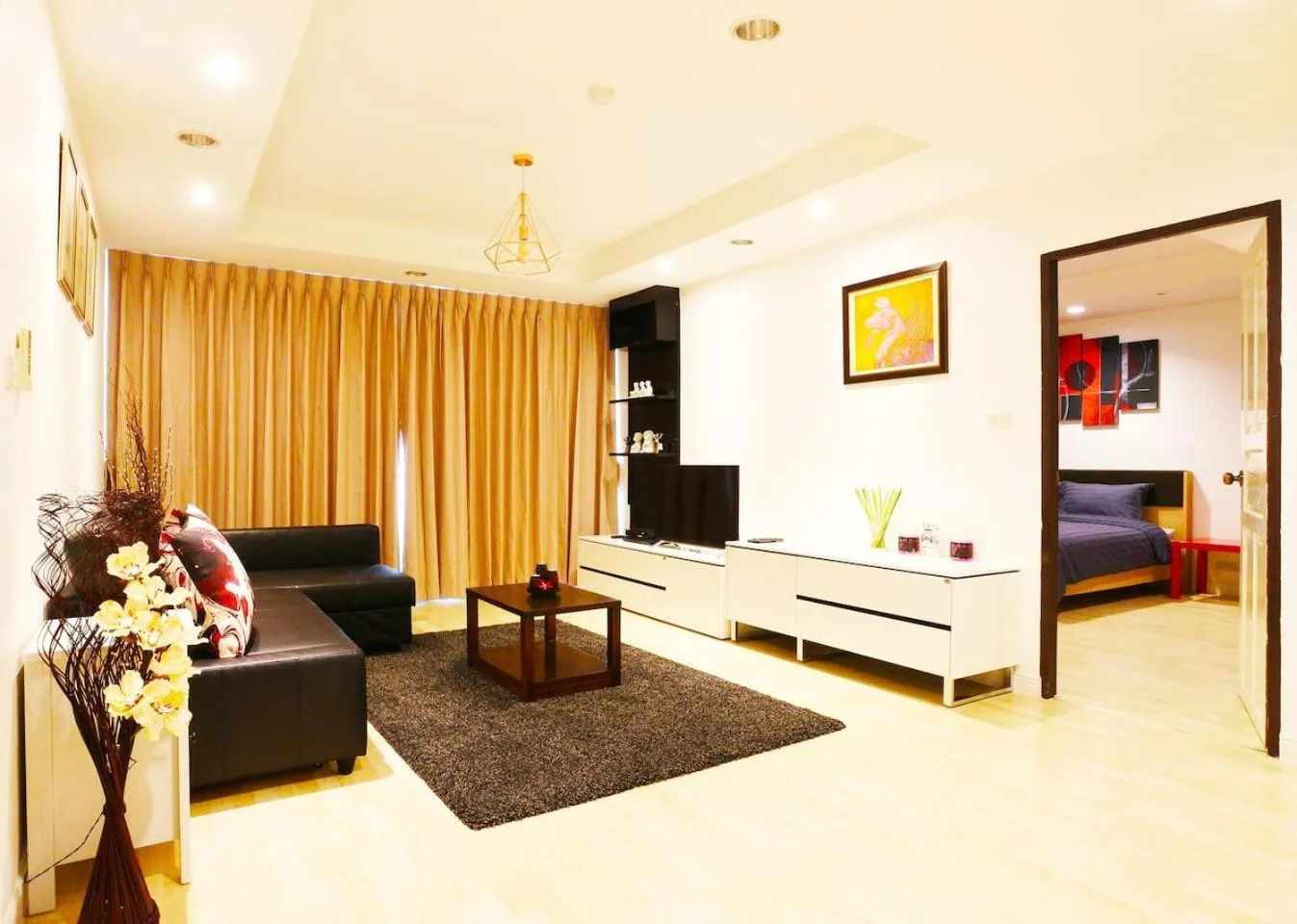 Living room, Bed in Serena Sathorn Suites