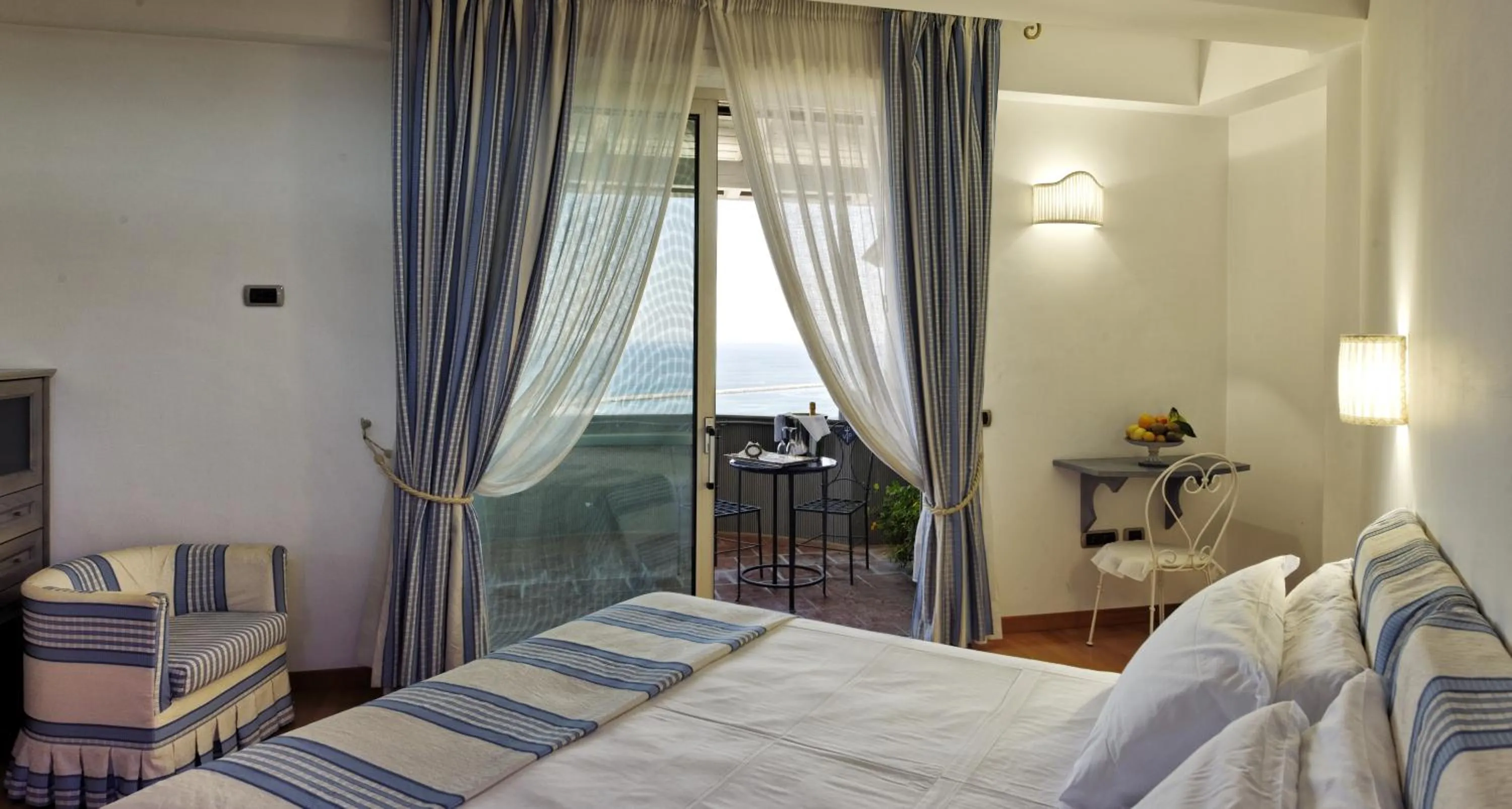 Bed in Villa Poseidon -Boutique Hotel-