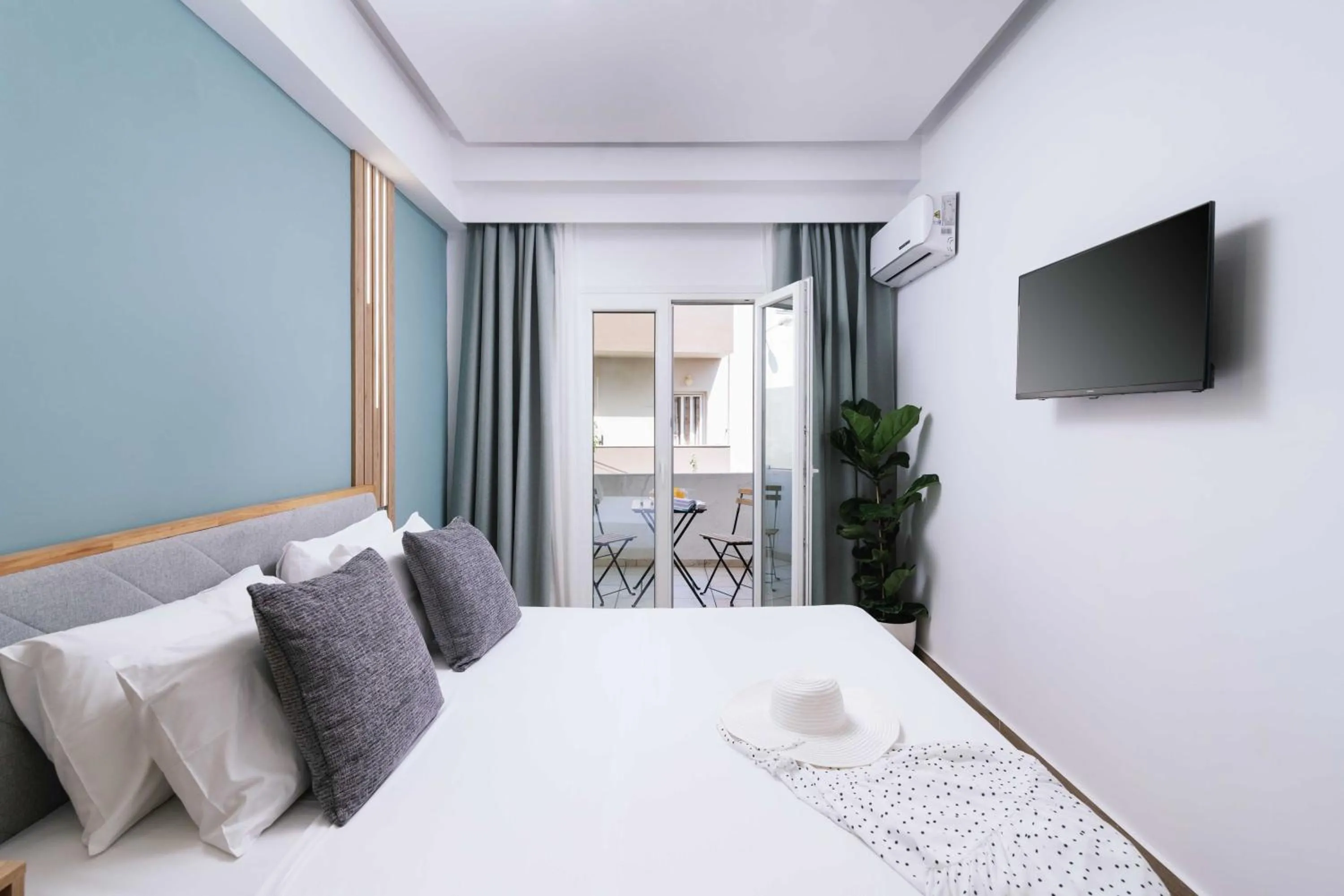 Bed in Ermis Luxury Suites & Apartments