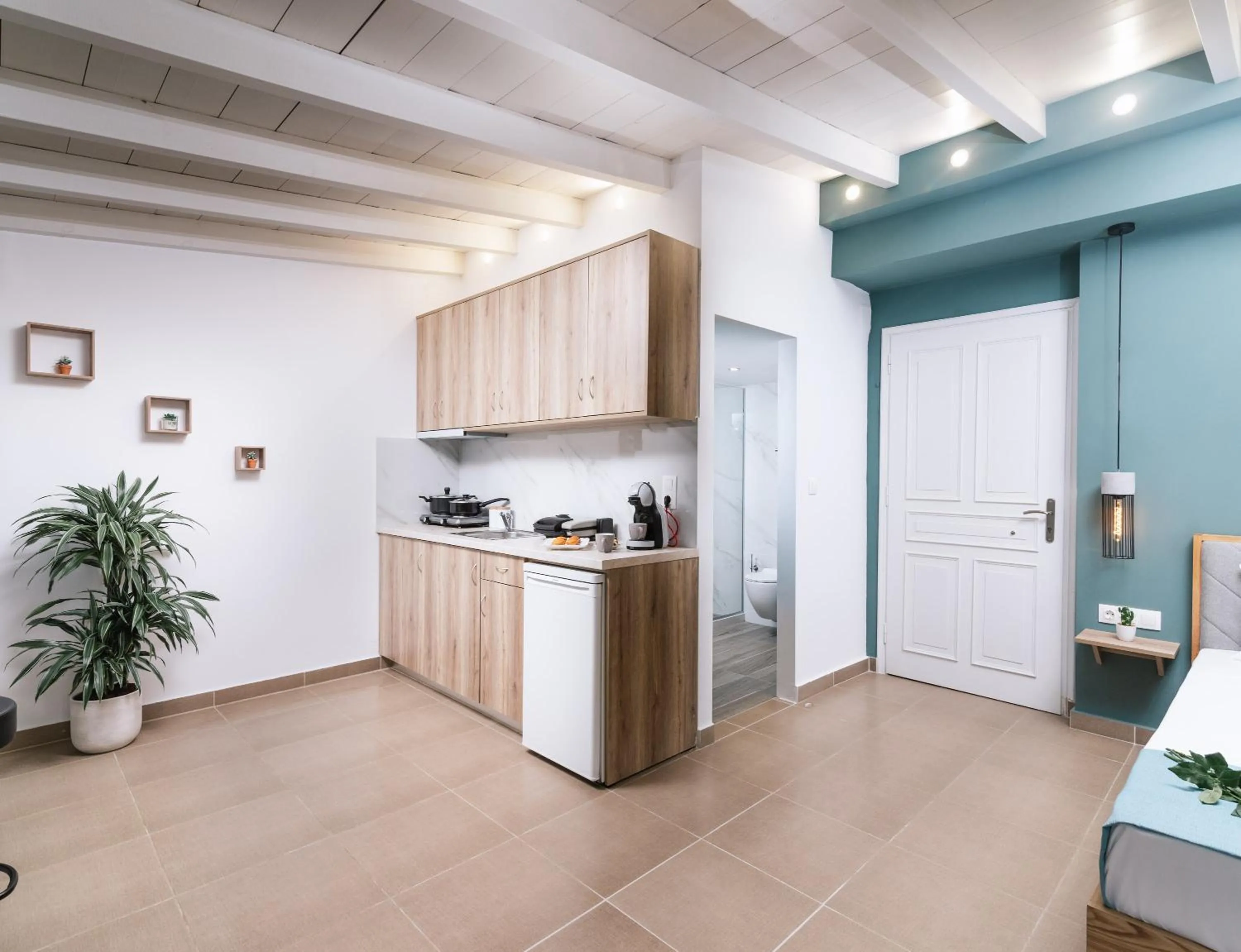 Kitchen or kitchenette in Ermis Luxury Suites & Apartments