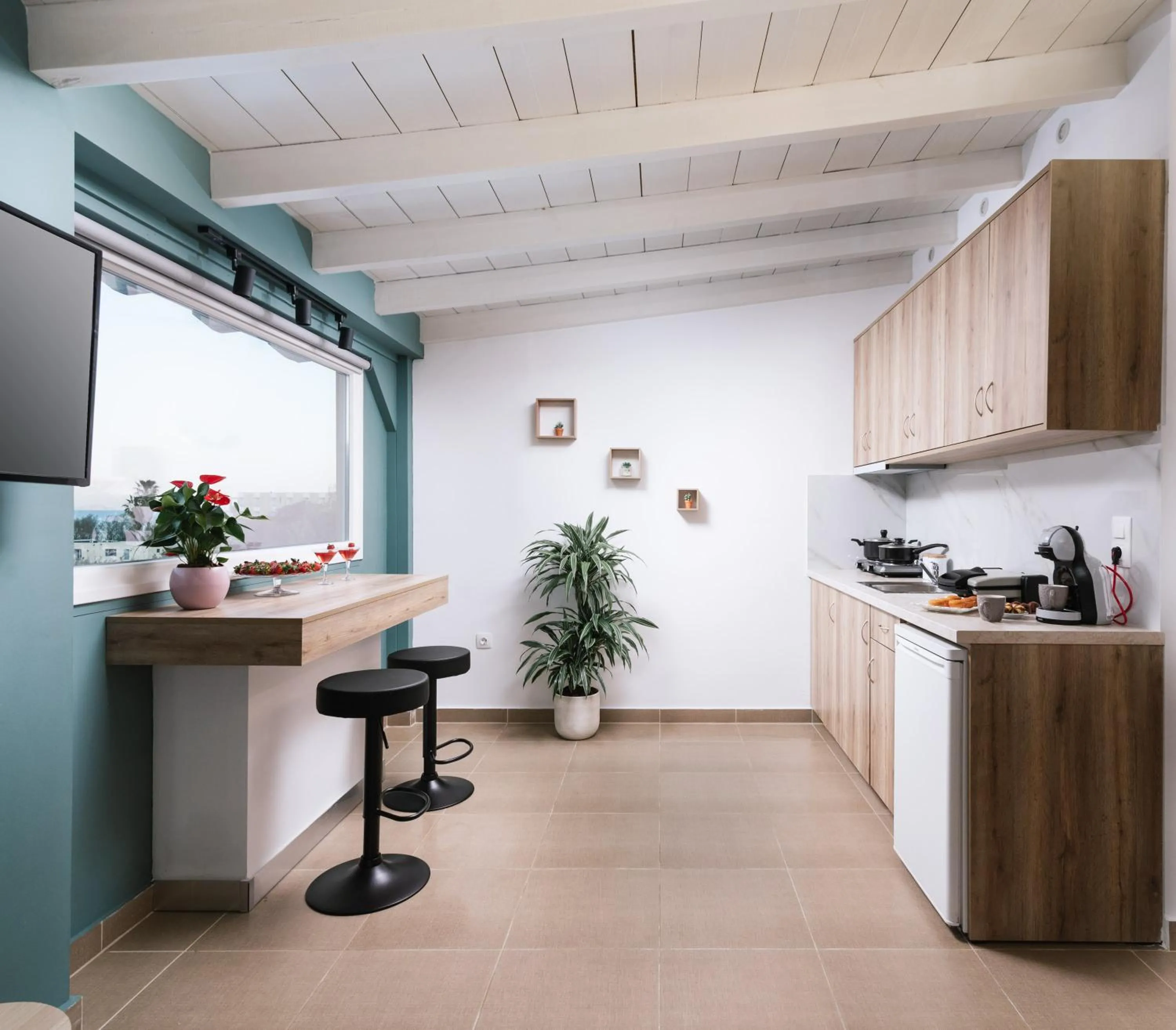 Kitchen or kitchenette in Ermis Luxury Suites & Apartments