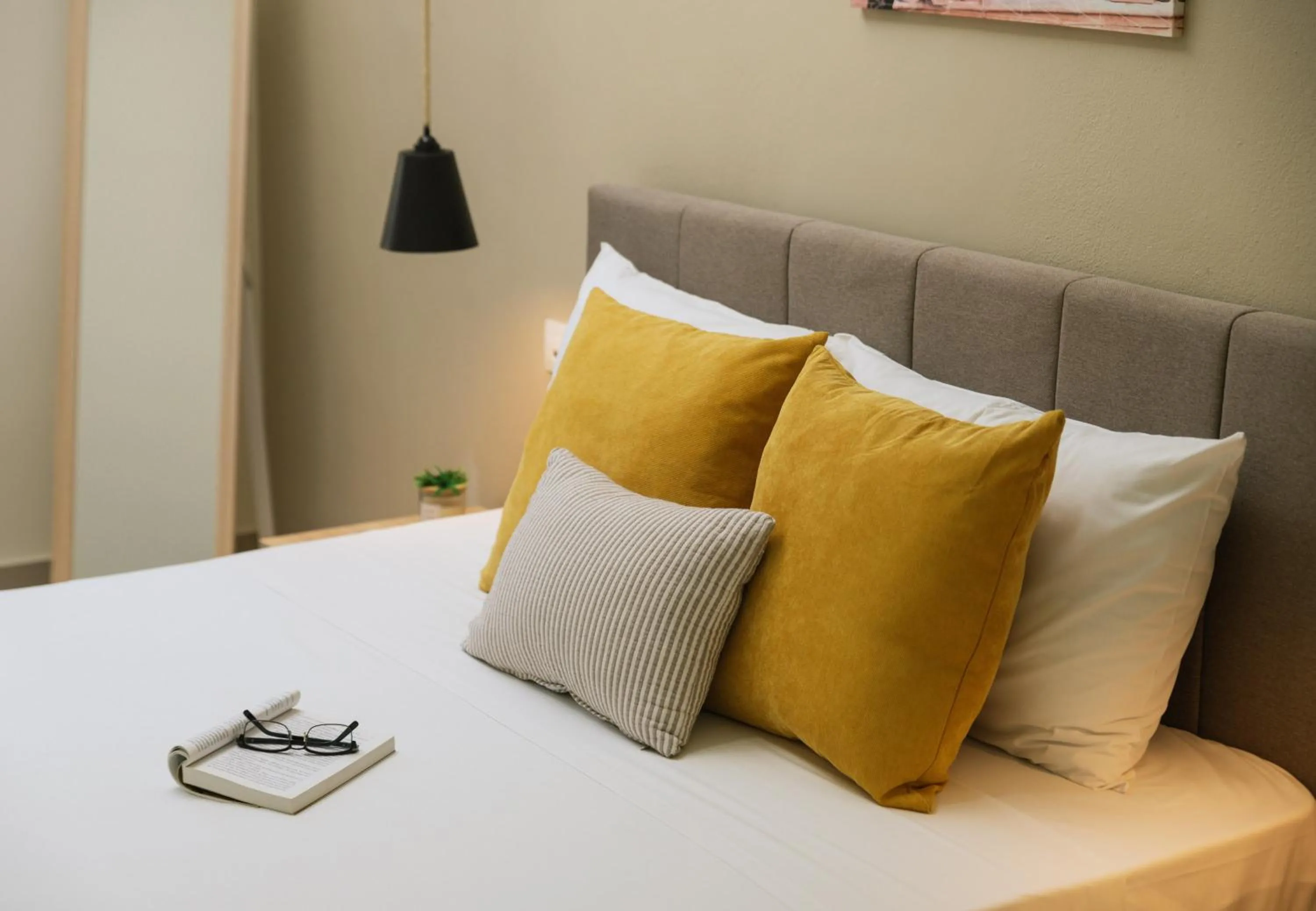 Bed in Ermis Luxury Suites & Apartments