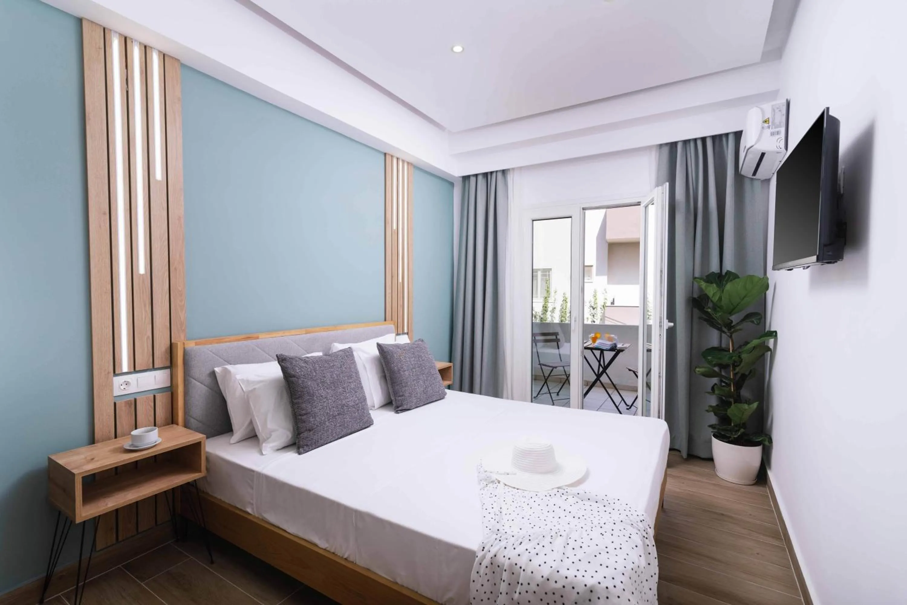 Bed in Ermis Luxury Suites & Apartments