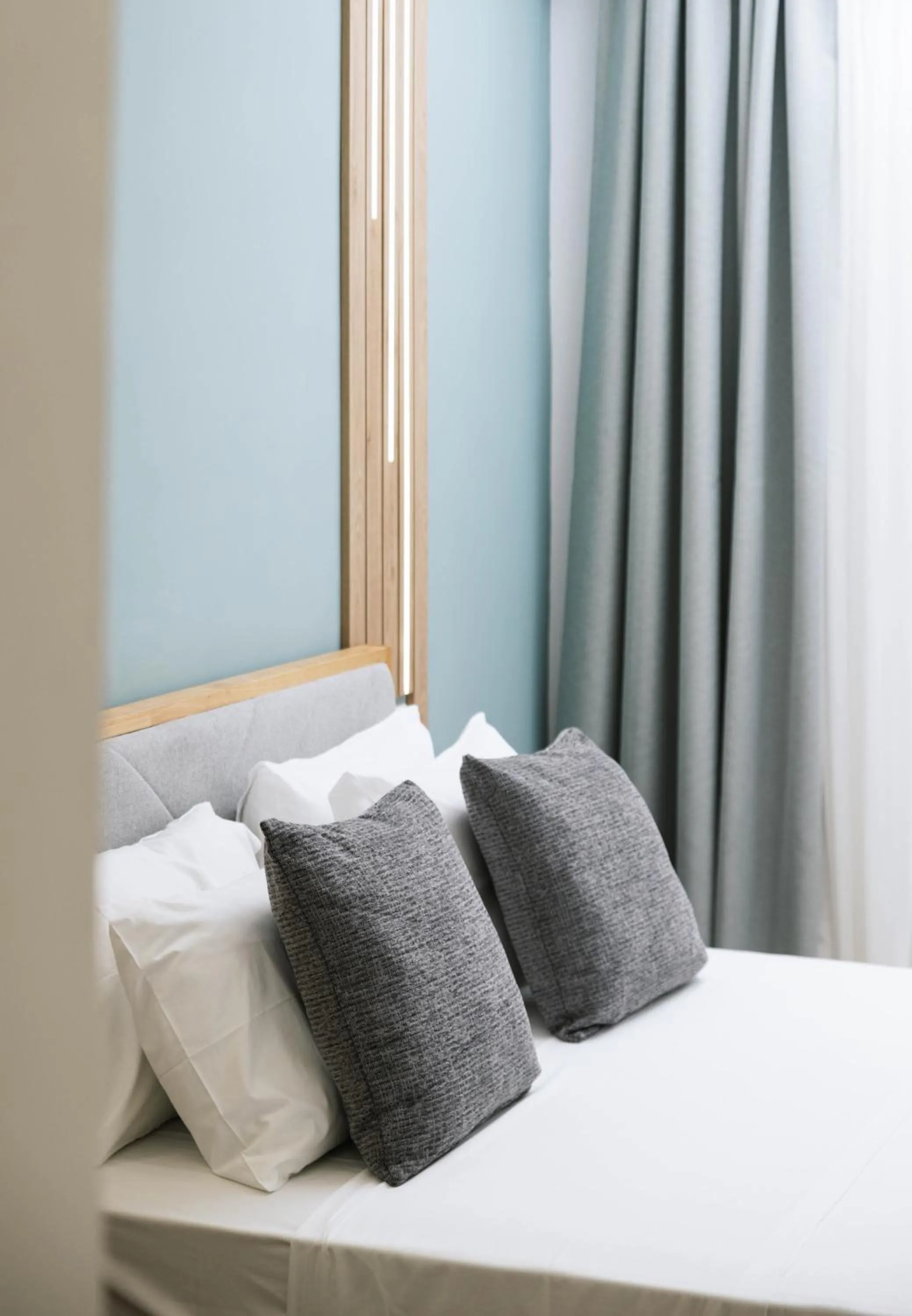 Bed in Ermis Luxury Suites & Apartments