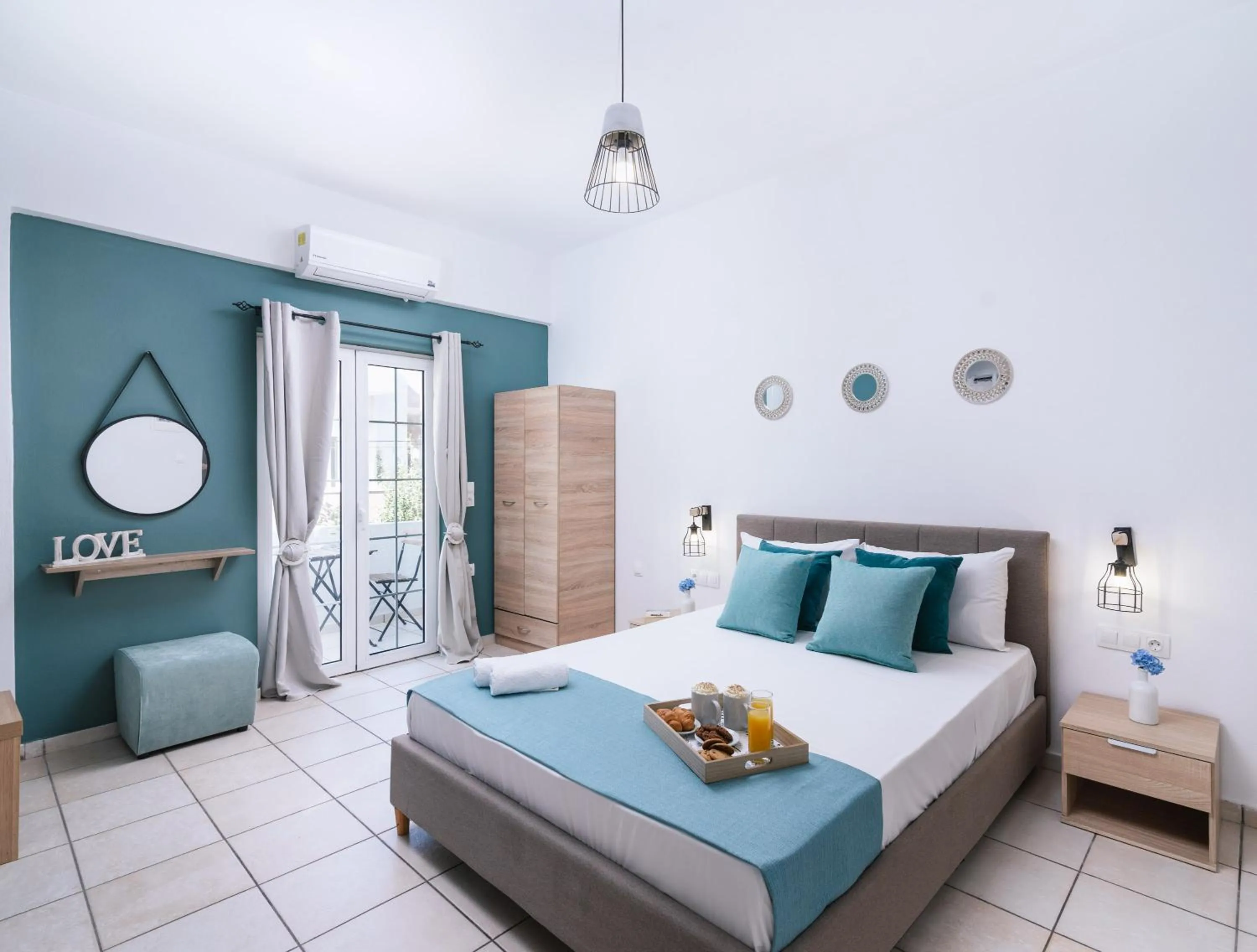 Bed in Ermis Luxury Suites & Apartments