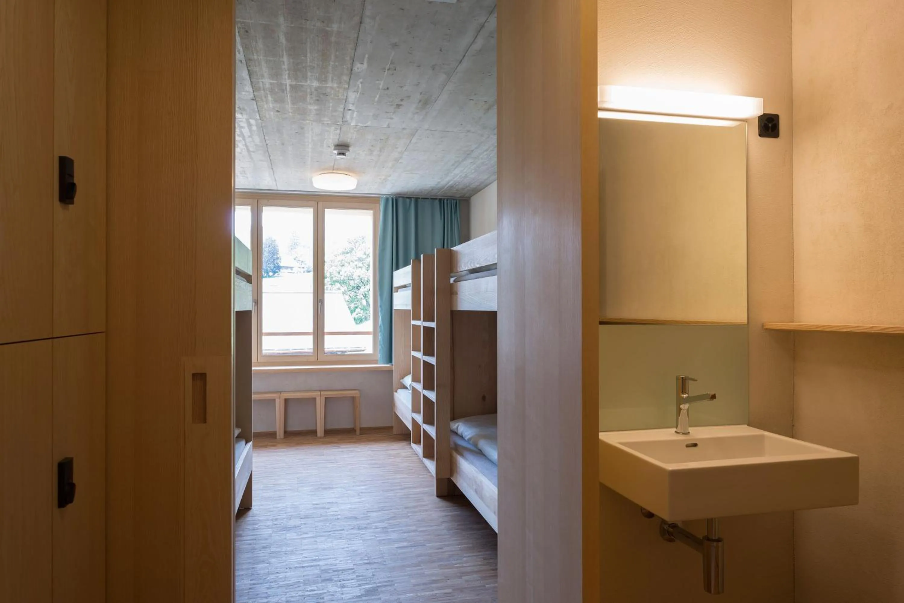 Bathroom, Bed in Saanen Gstaad Youth Hostel