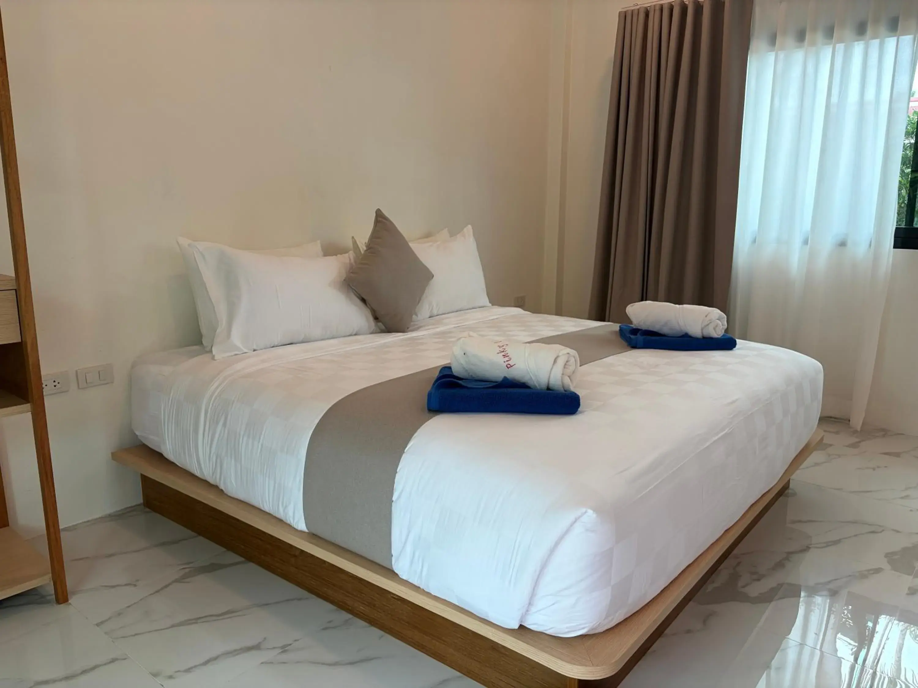 Bed in Pinky Bungalows Resort & Villa Bed in Pinky Bungalows Resort & Villa