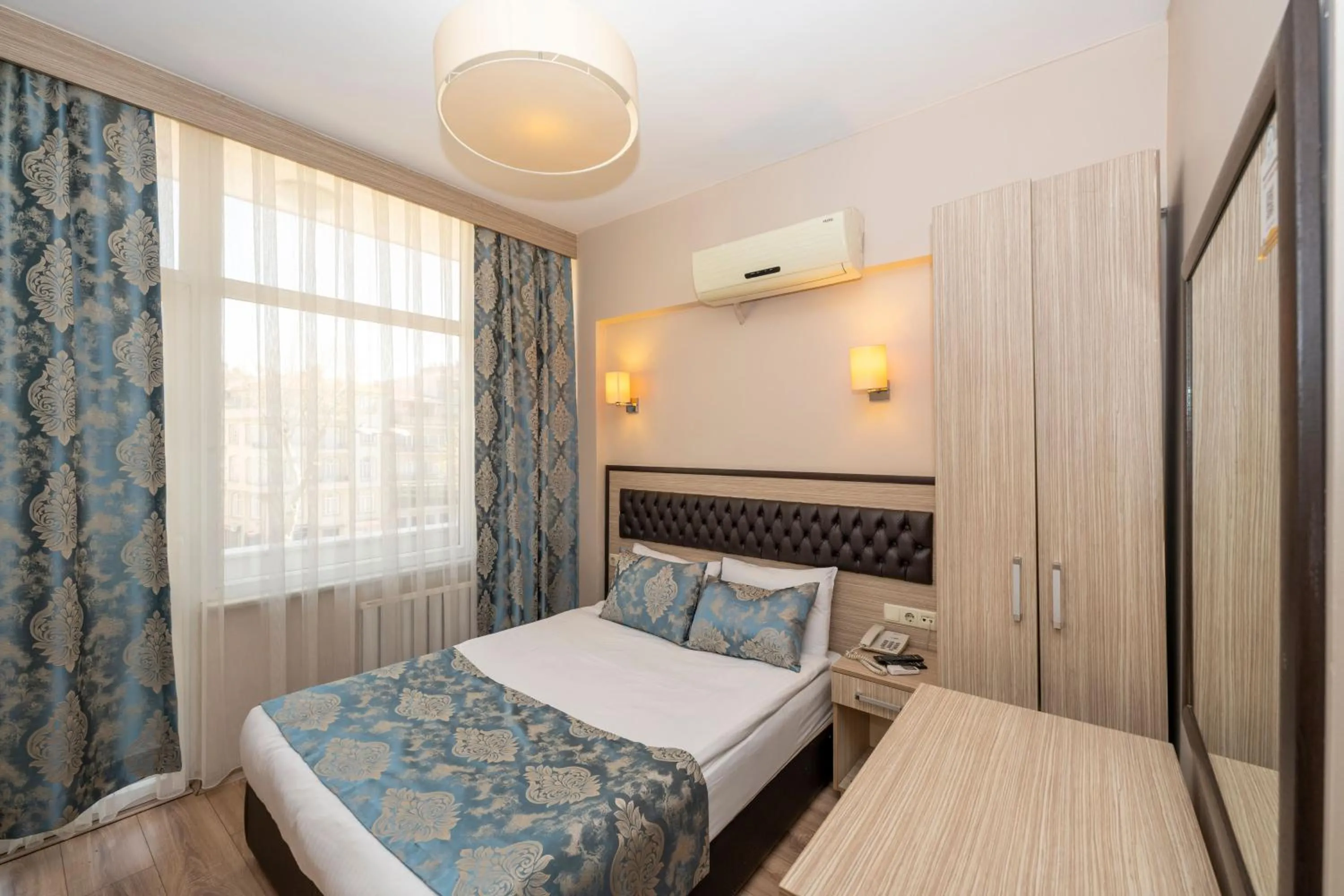 Photo of the whole room, Bed in Tugra Hotel