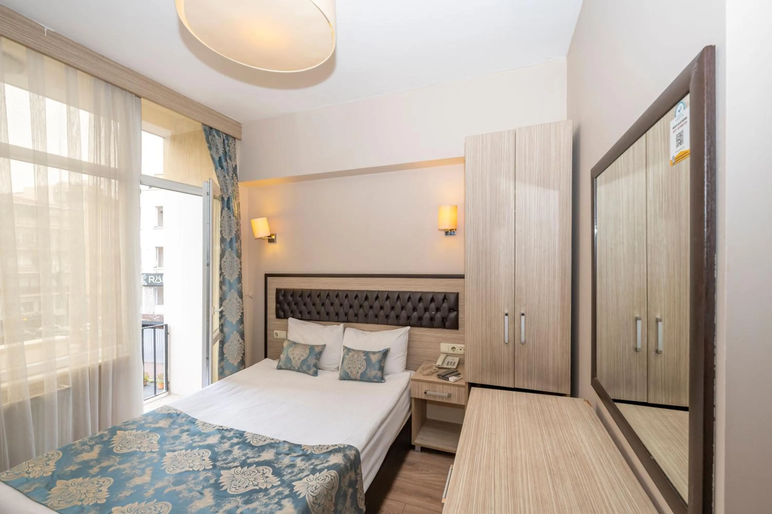 Photo of the whole room, Bed in Tugra Hotel