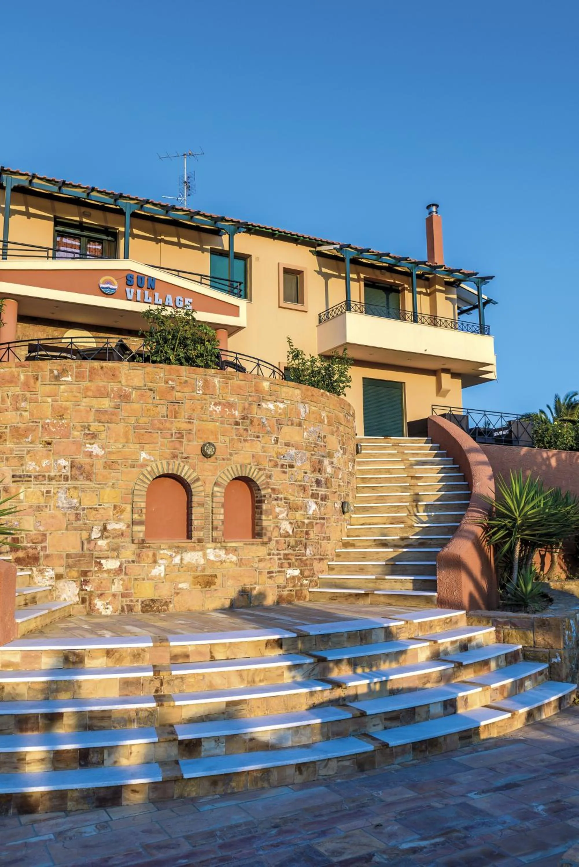 Property building in Sun Village Hotel Apartments