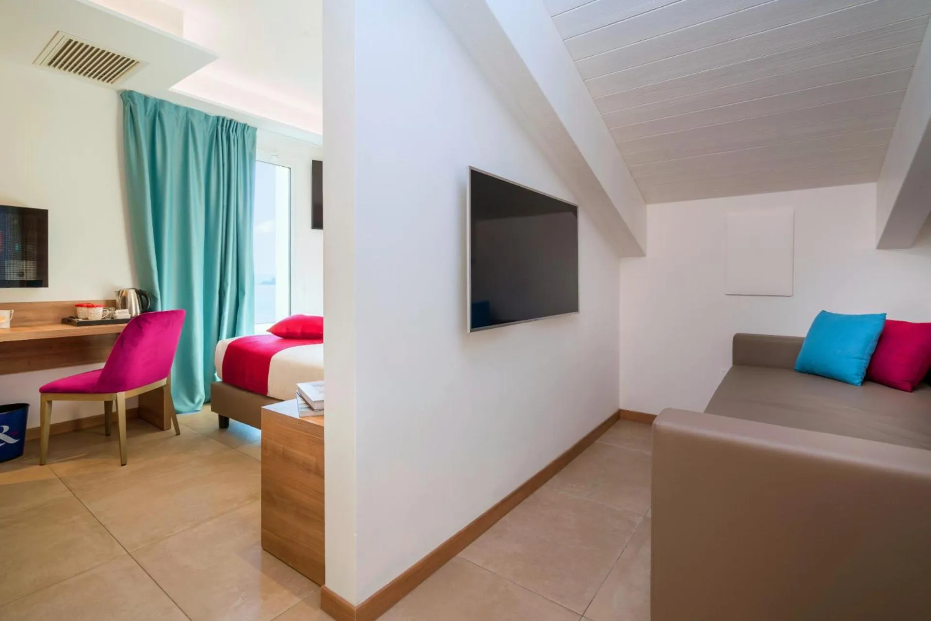 Bed in You & Me Beach Hotel