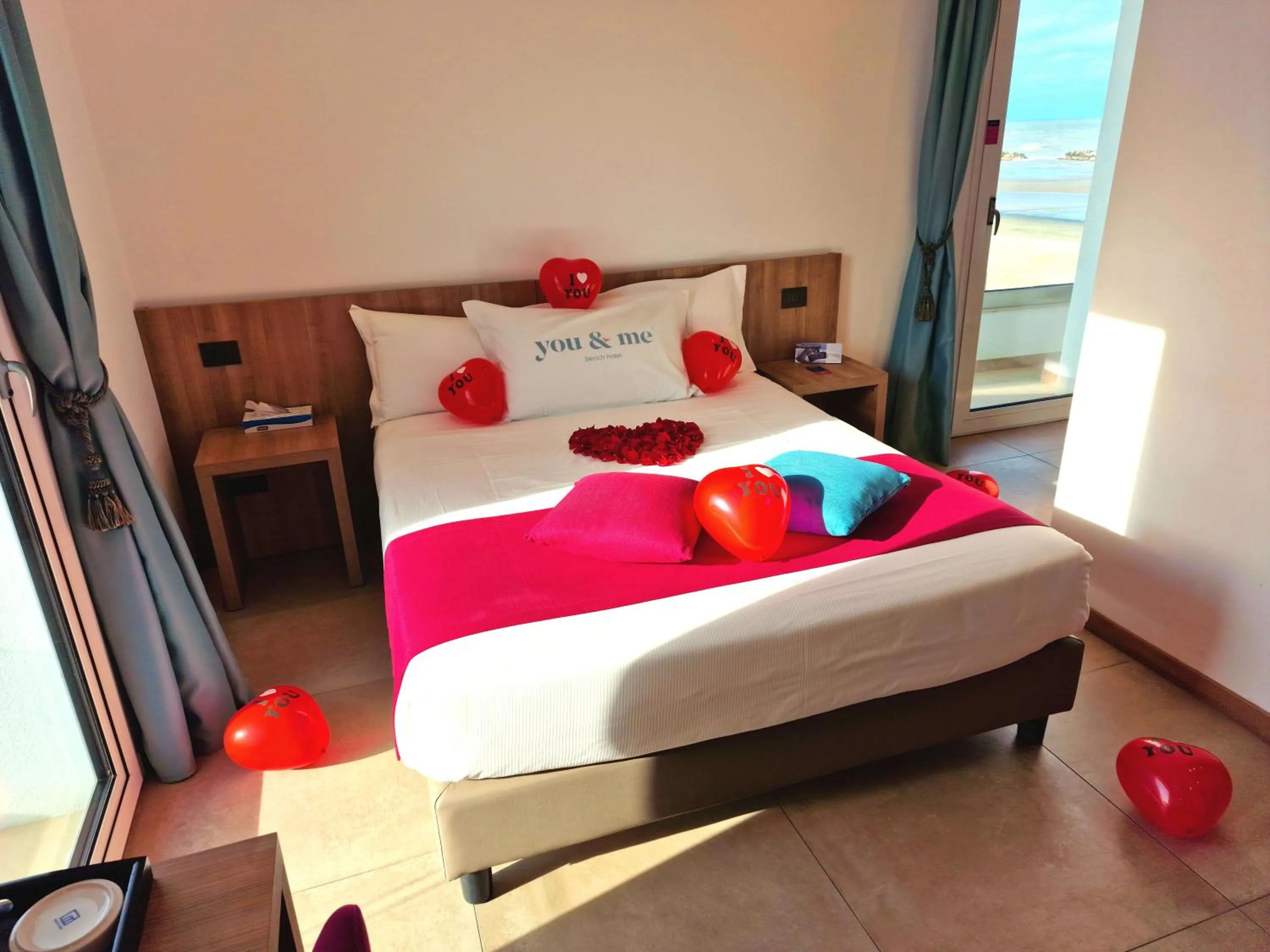 Bed in You & Me Beach Hotel