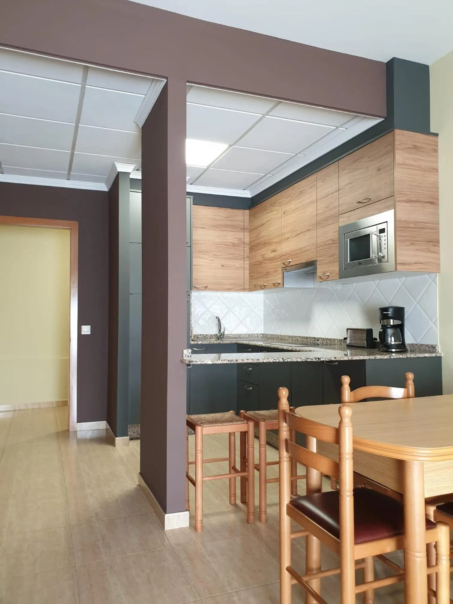 Kitchen or kitchenette in Apartamentos Atlántico Resort