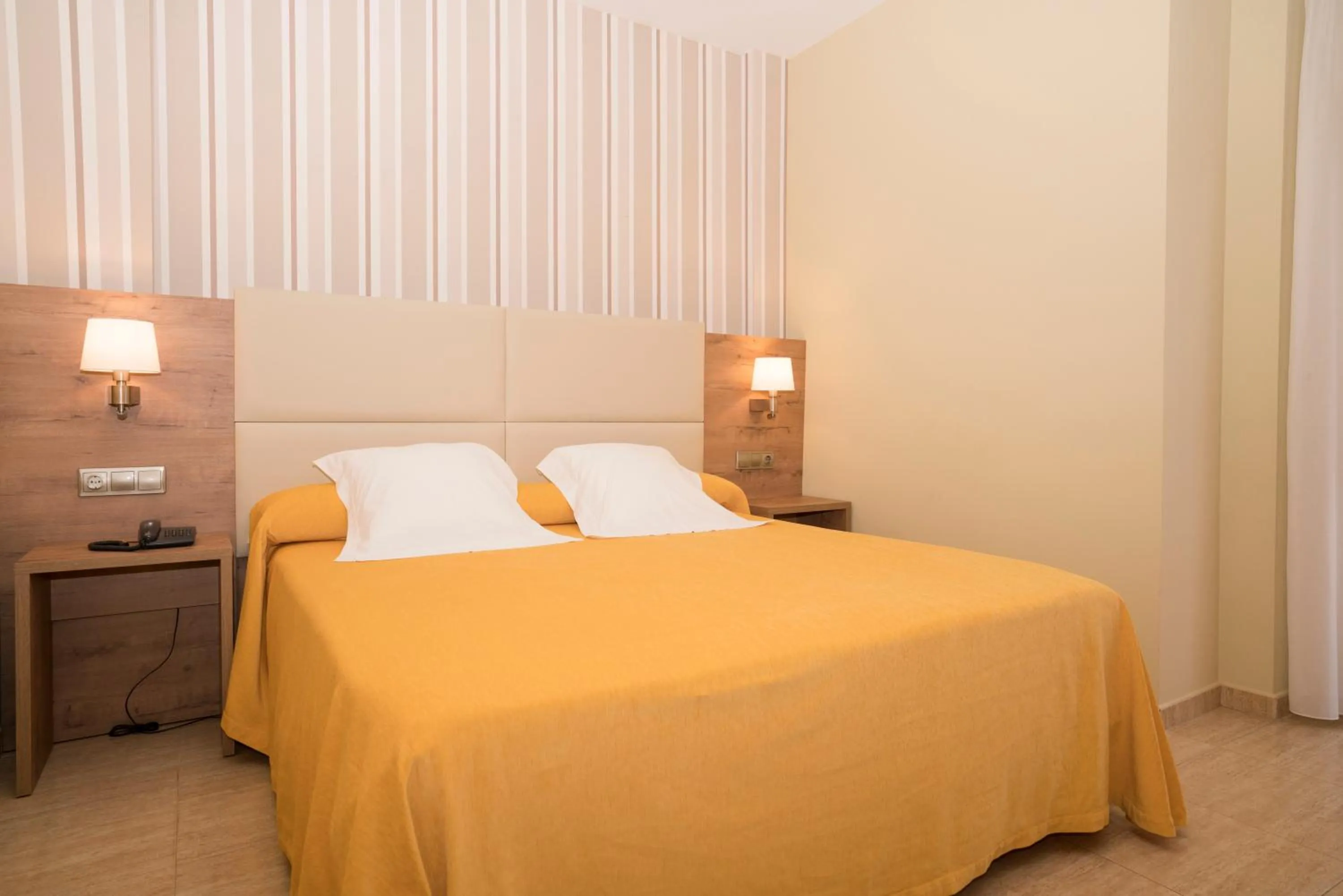 Bed in Apartamentos Atlántico Resort