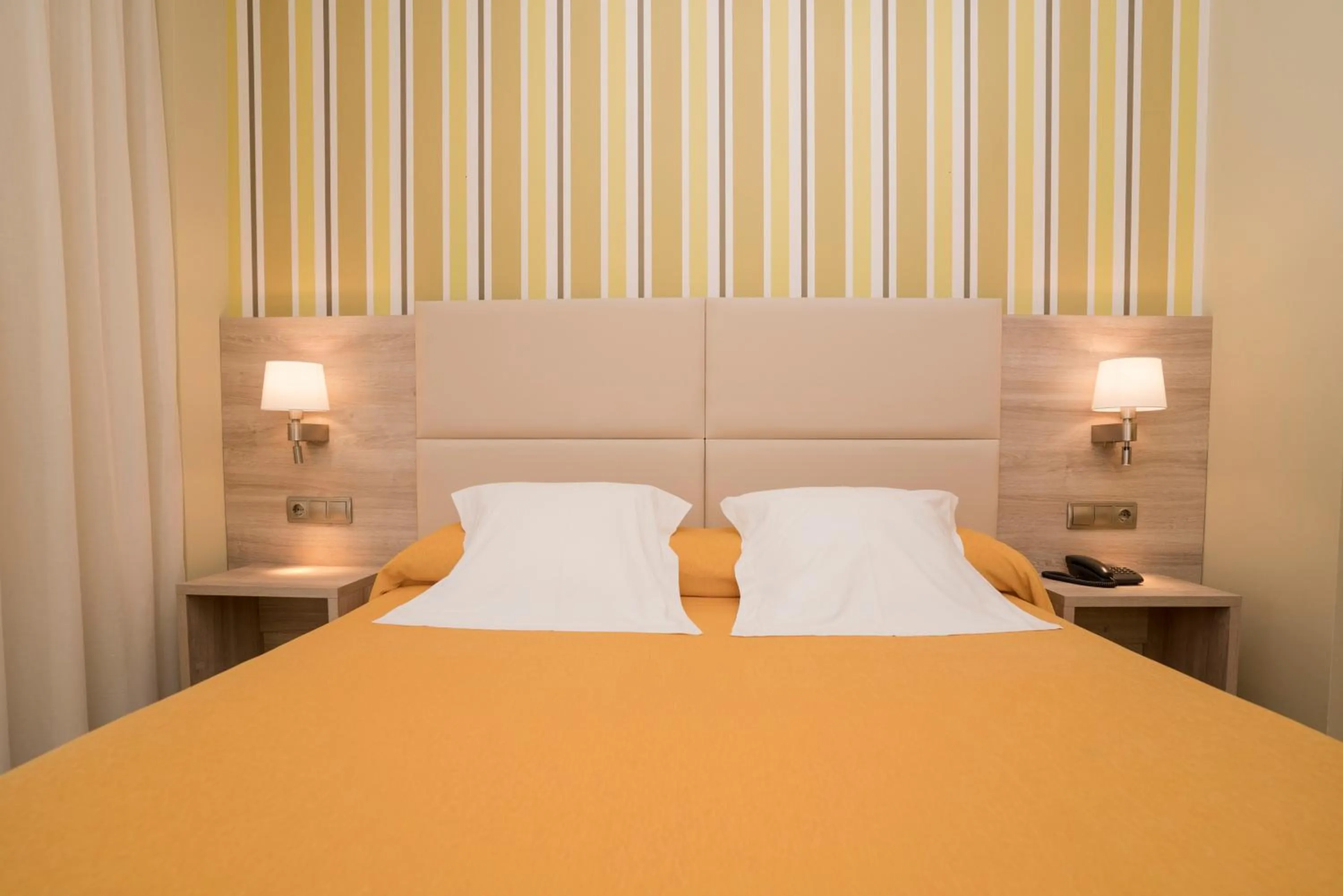 Bed in Apartamentos Atlántico Resort