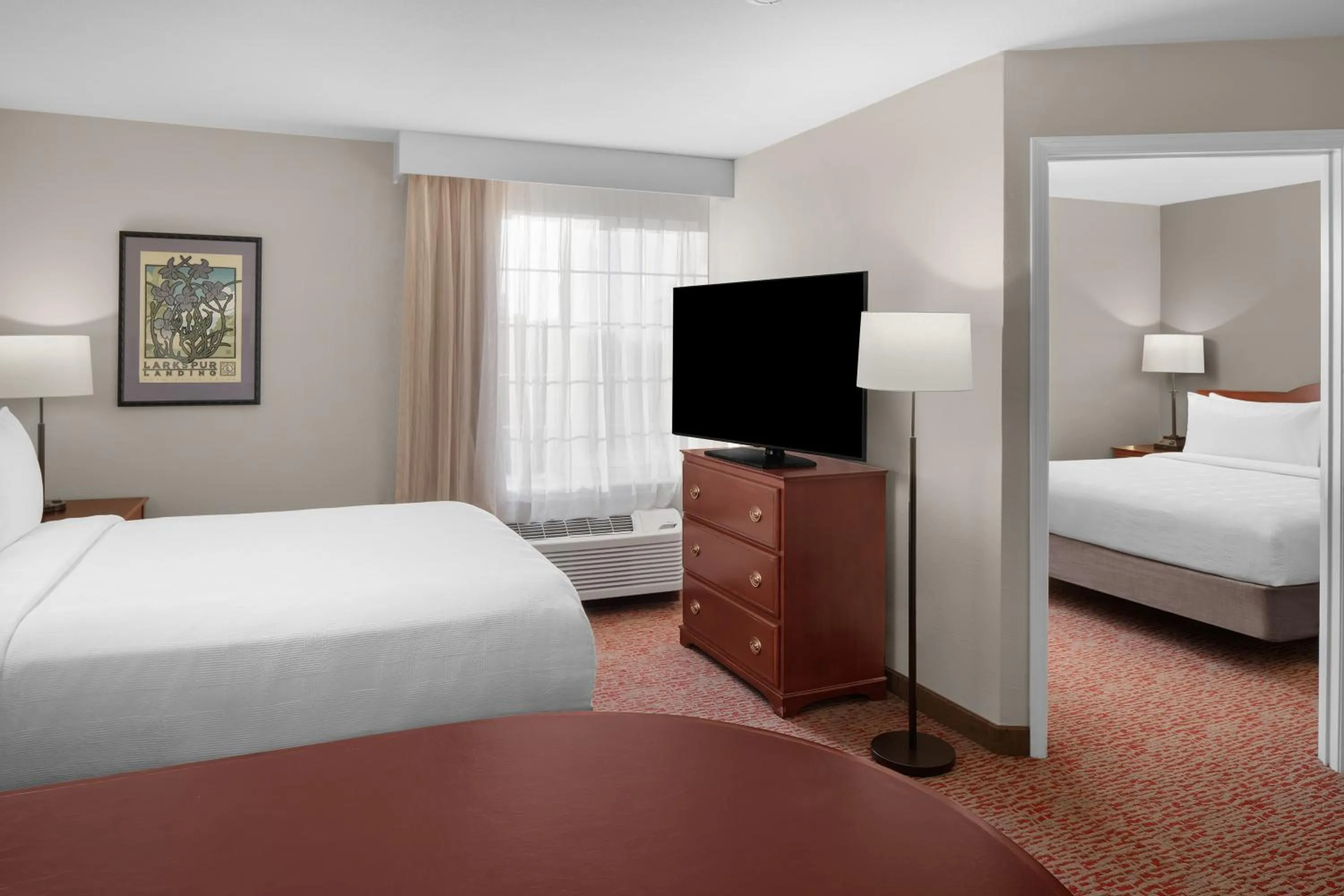 Bed in Larkspur Landing Extended Stay Suites Pleasanton