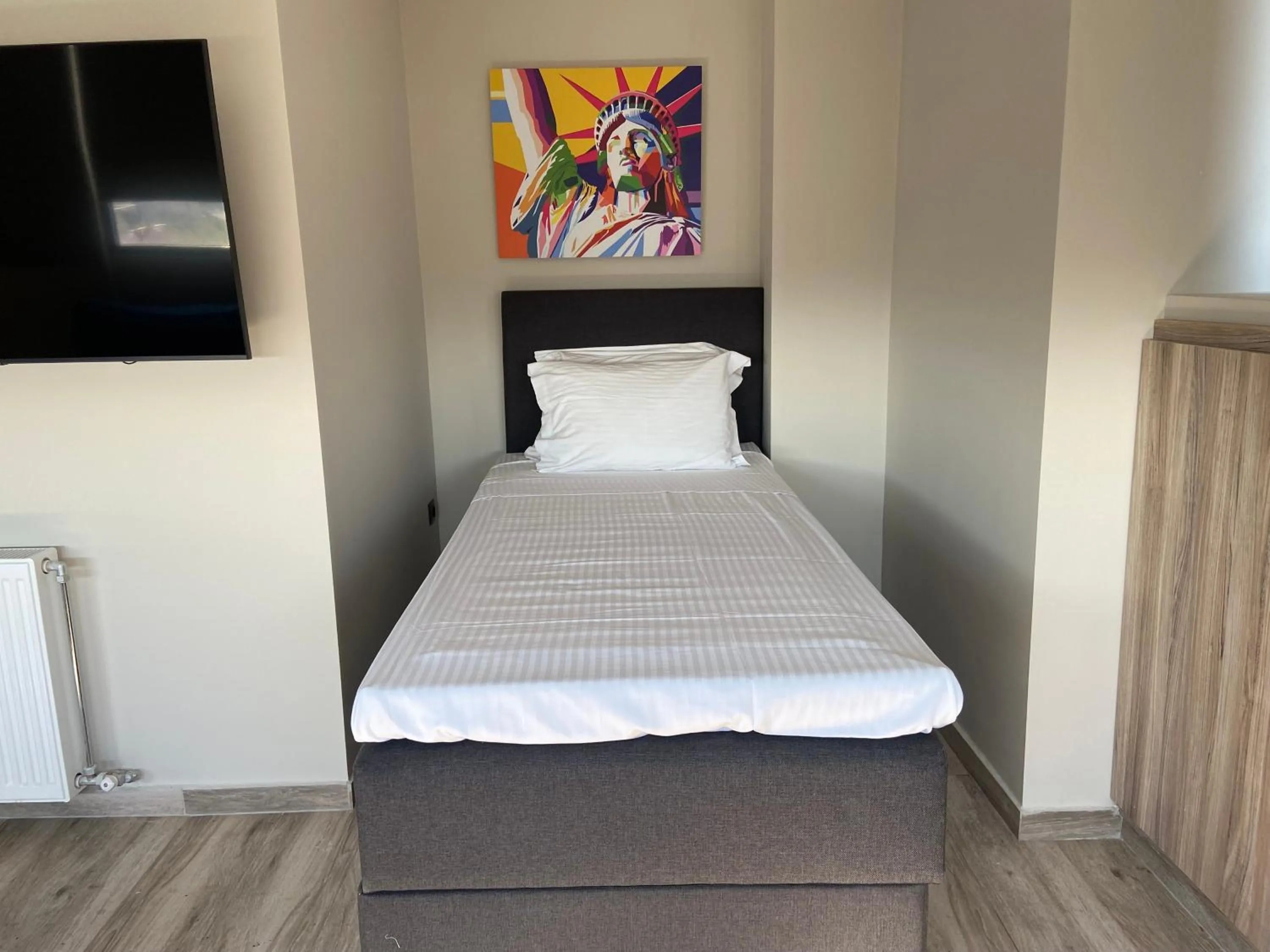 Bed in Connect Studios & Apartments