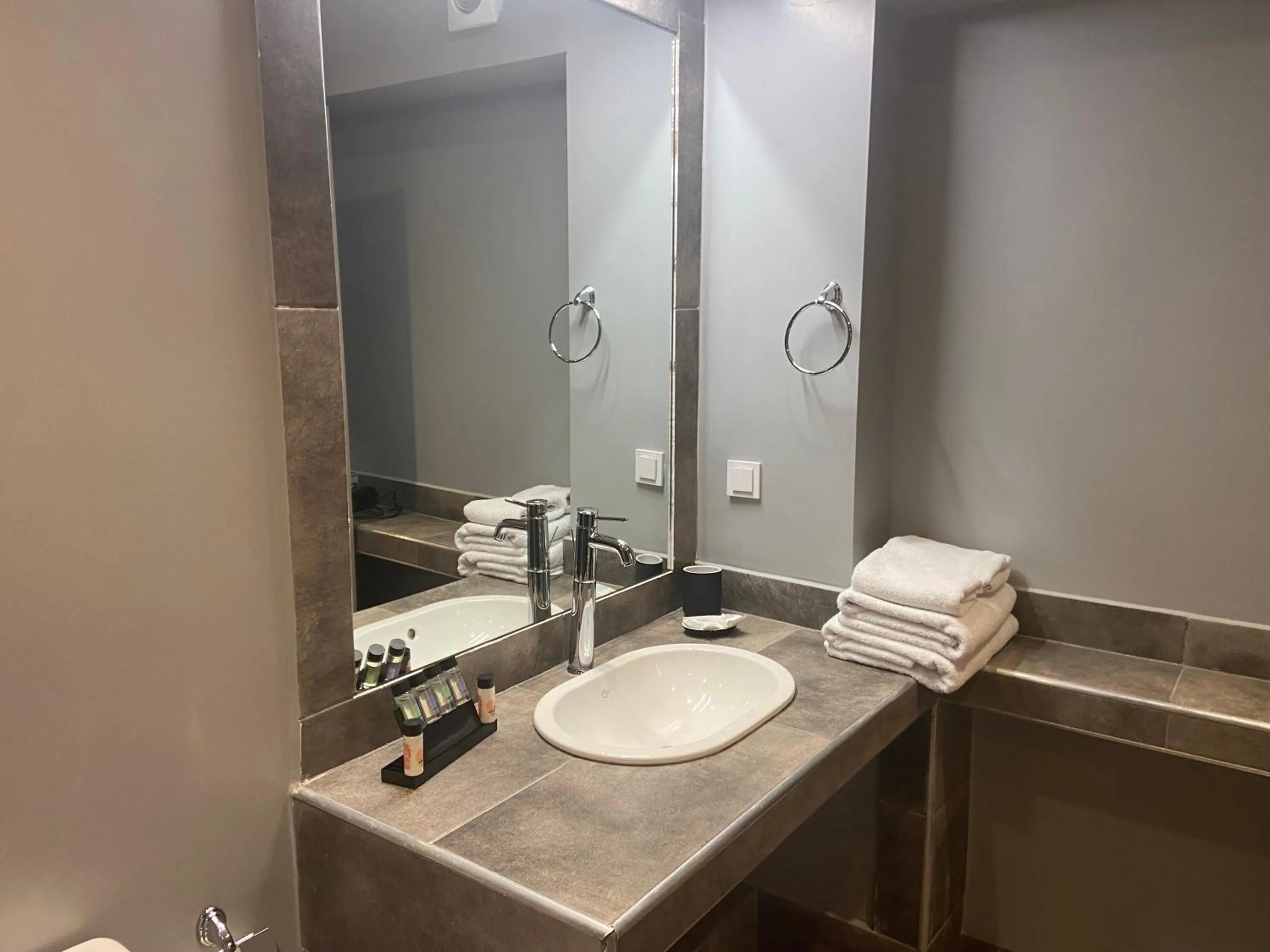 Bathroom in Connect Studios & Apartments