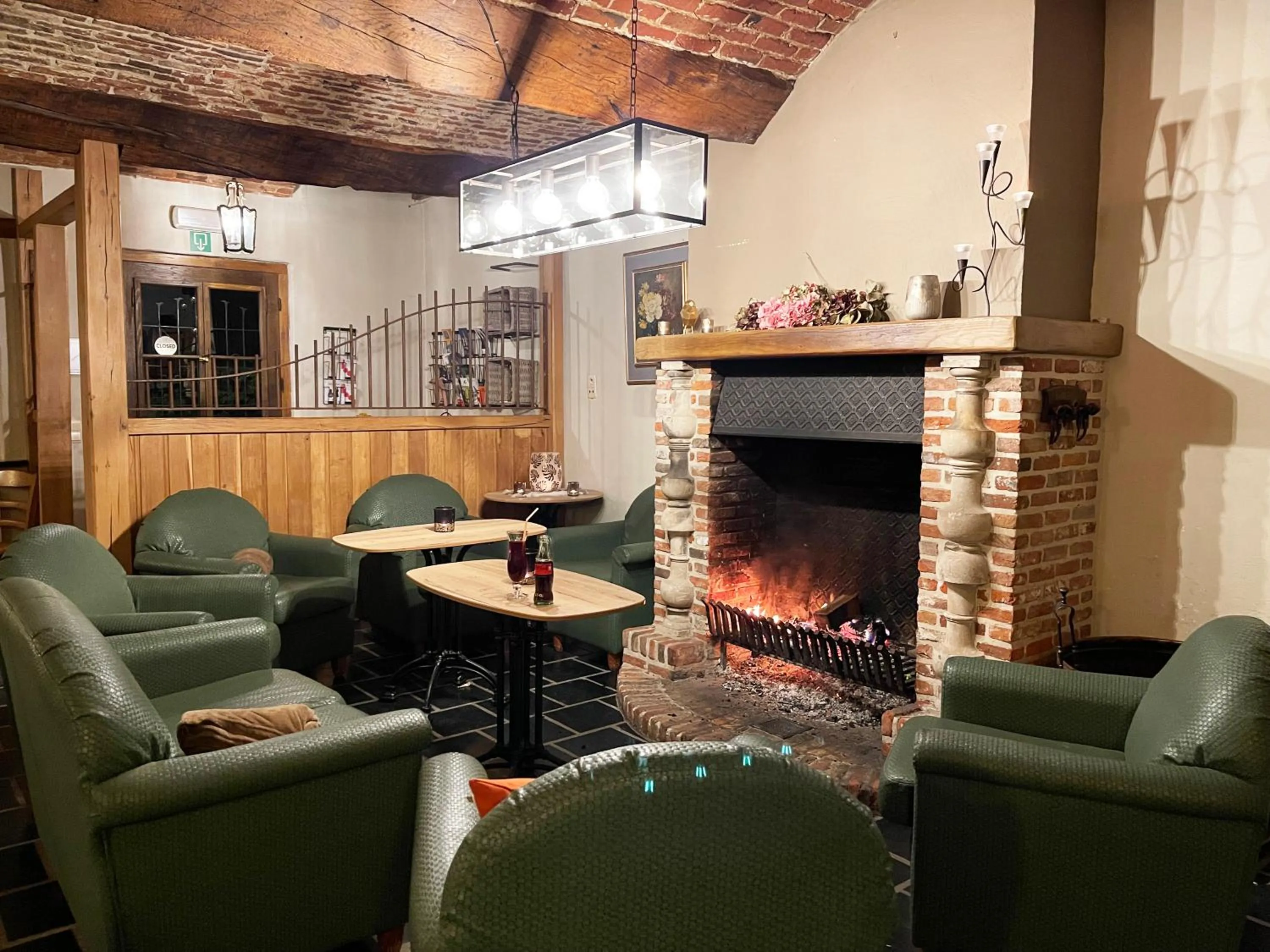 Communal lounge/ TV room in Hotel het Elsland