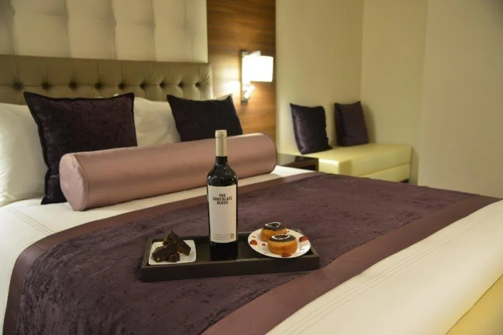 Bed in The Envoy Hotel Abuja