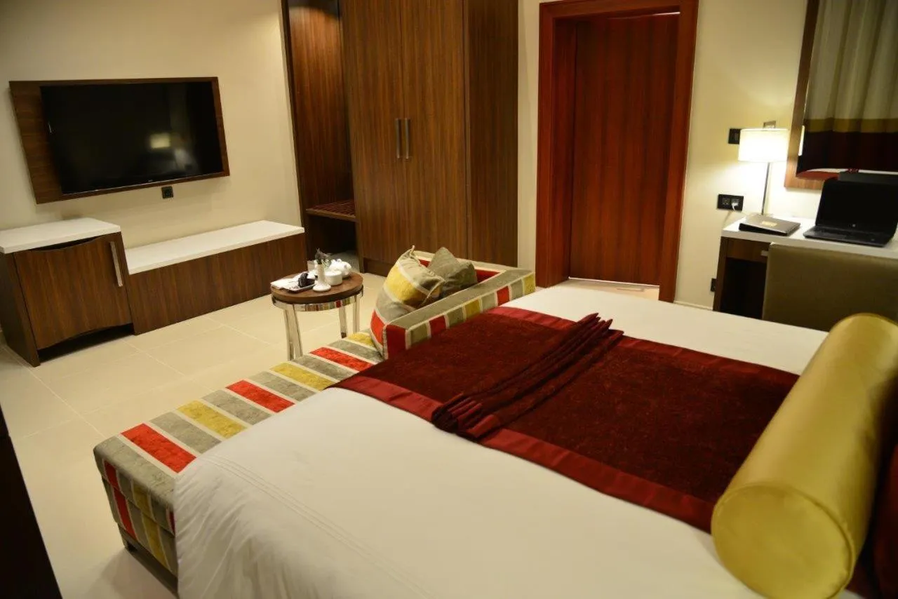 Bed in The Envoy Hotel Abuja