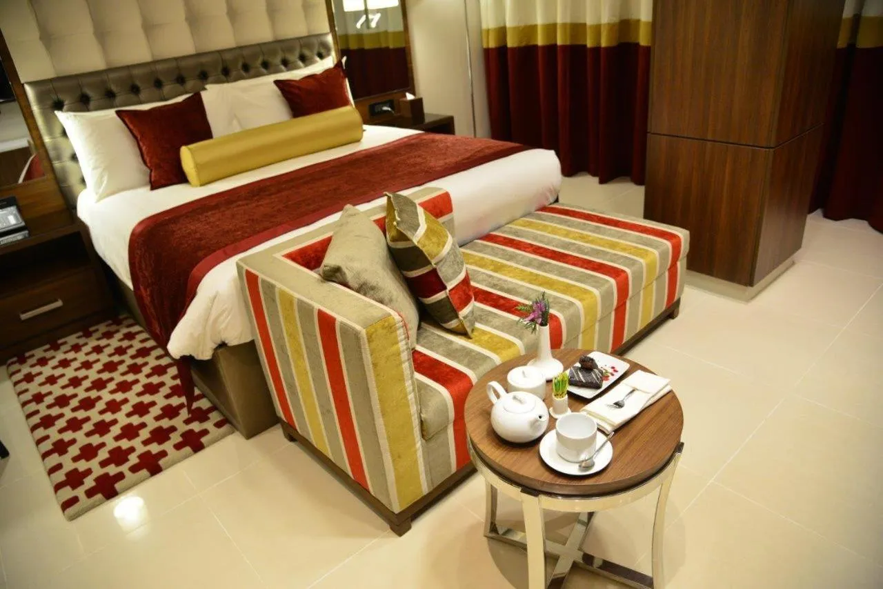 Bed in The Envoy Hotel Abuja