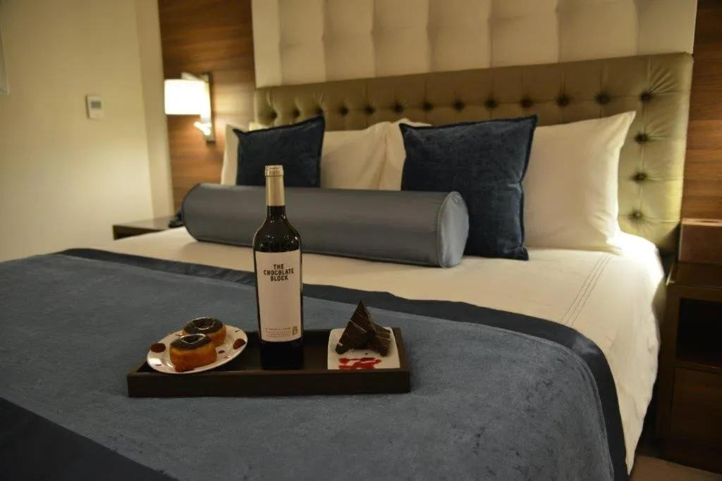 Bed in The Envoy Hotel Abuja