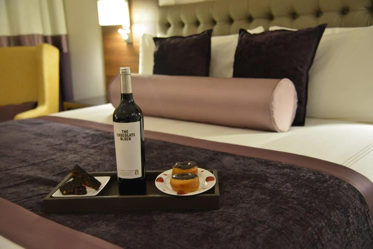 Bed in The Envoy Hotel Abuja