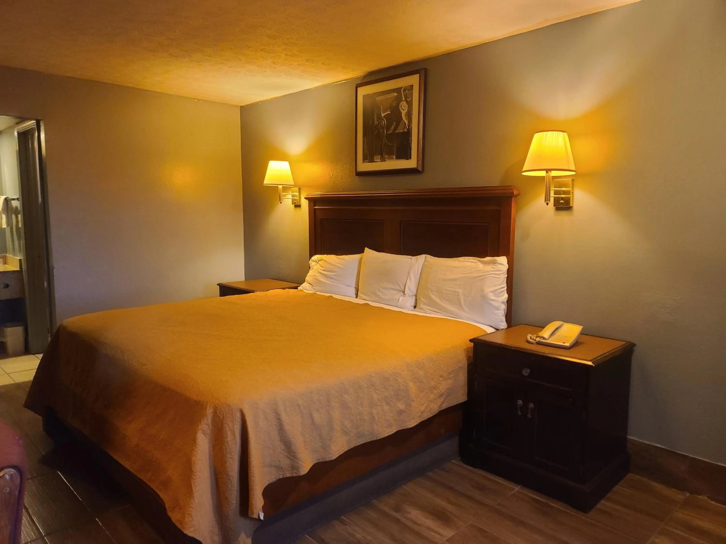 Bed in Garden Inn and Extended Stay