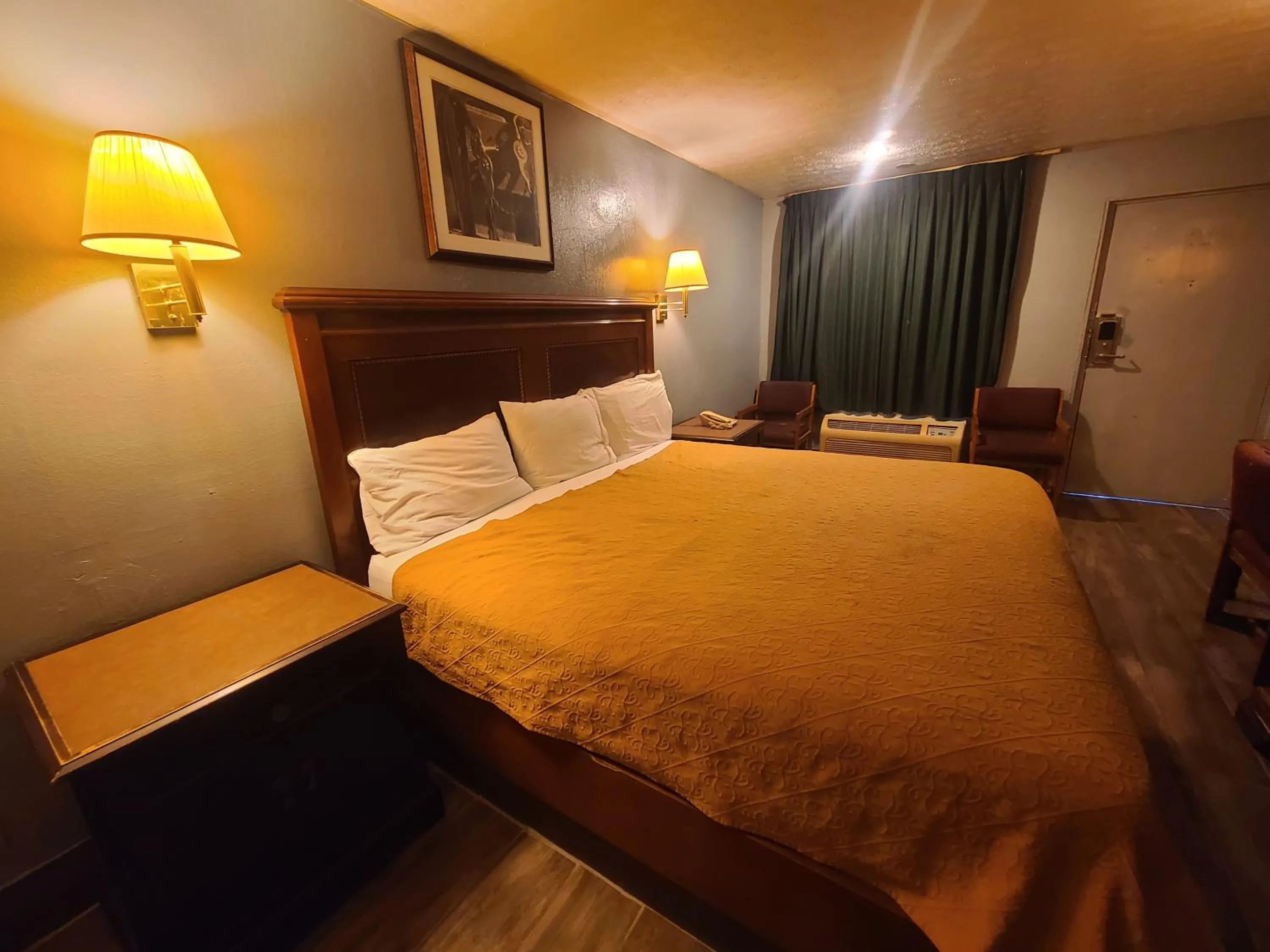 Bed in Garden Inn and Extended Stay