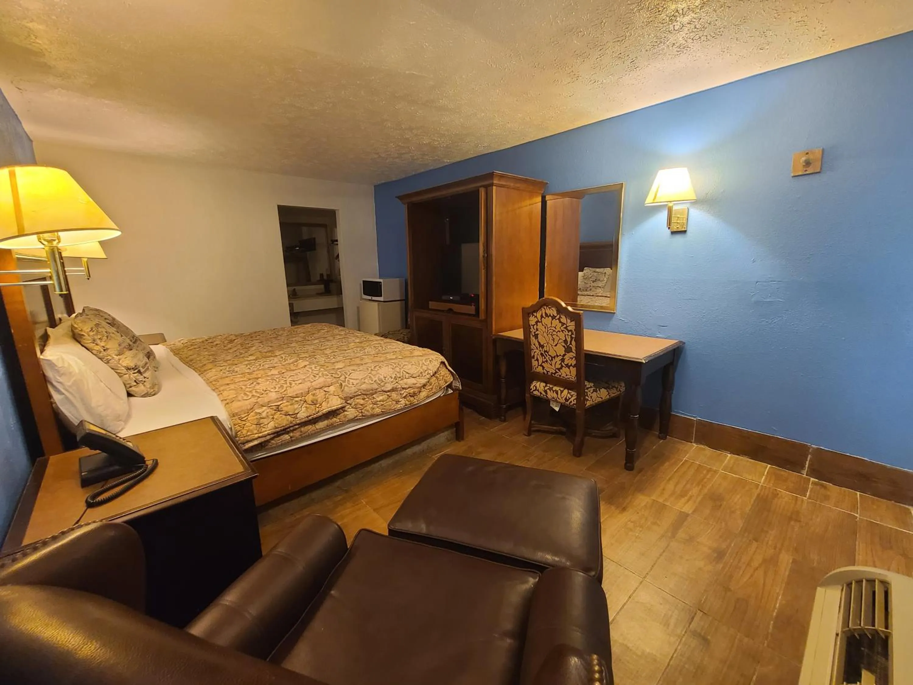 Bed in Garden Inn and Extended Stay