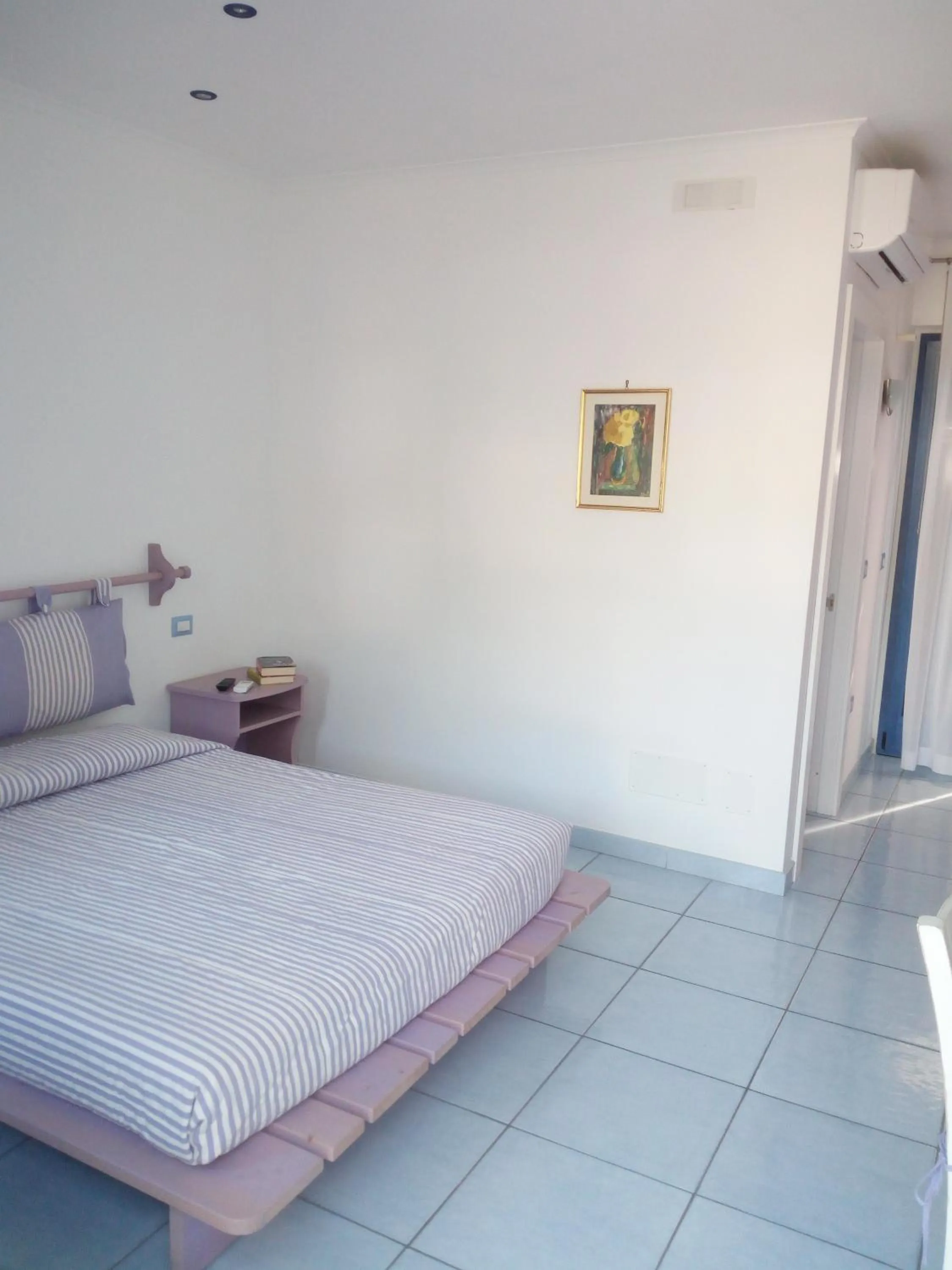 Bed in B&B Conca del Faro